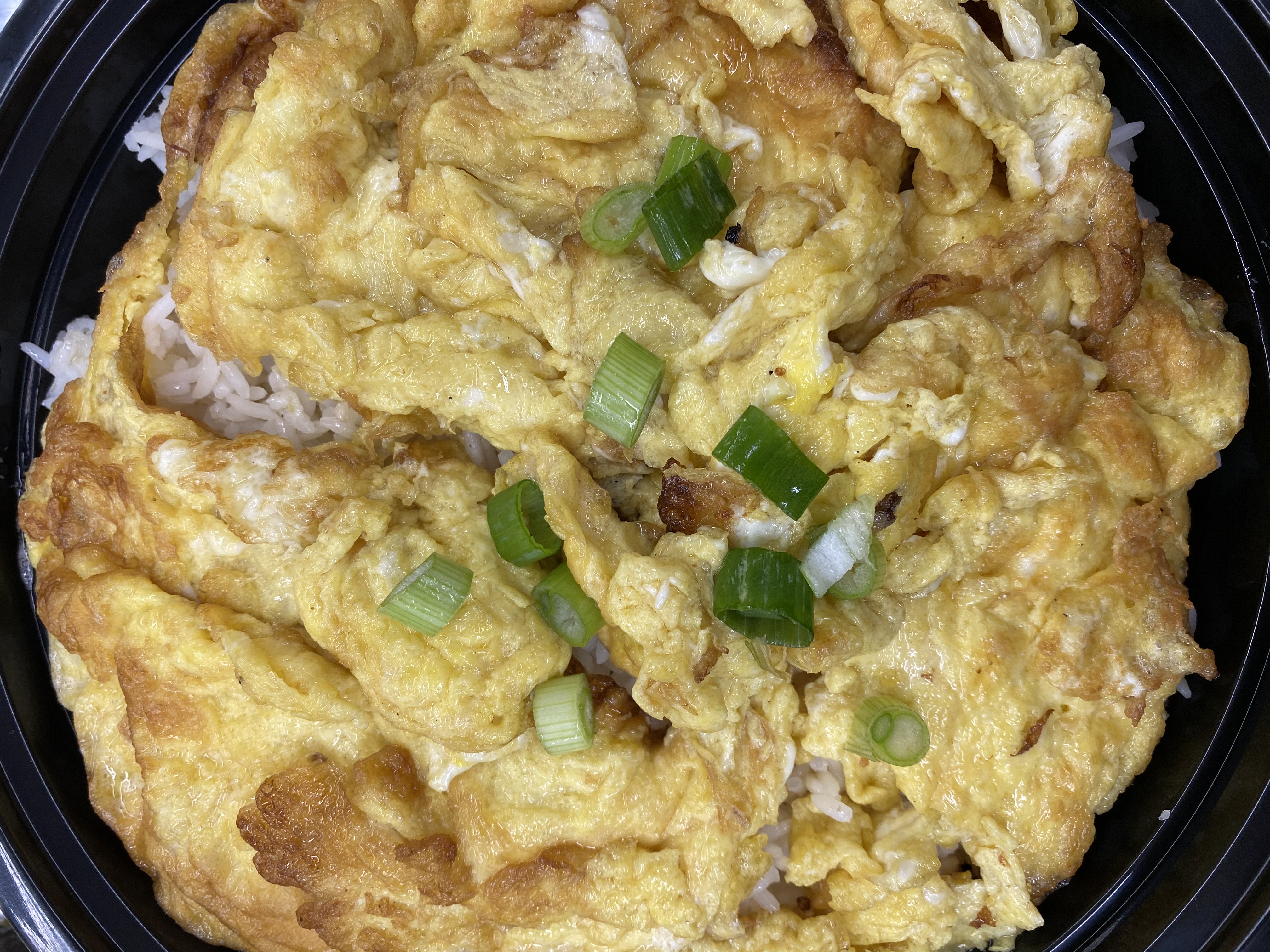 Order Thai Omelette Over Rice  food online from Lucky Deli store, Los Angeles on bringmethat.com