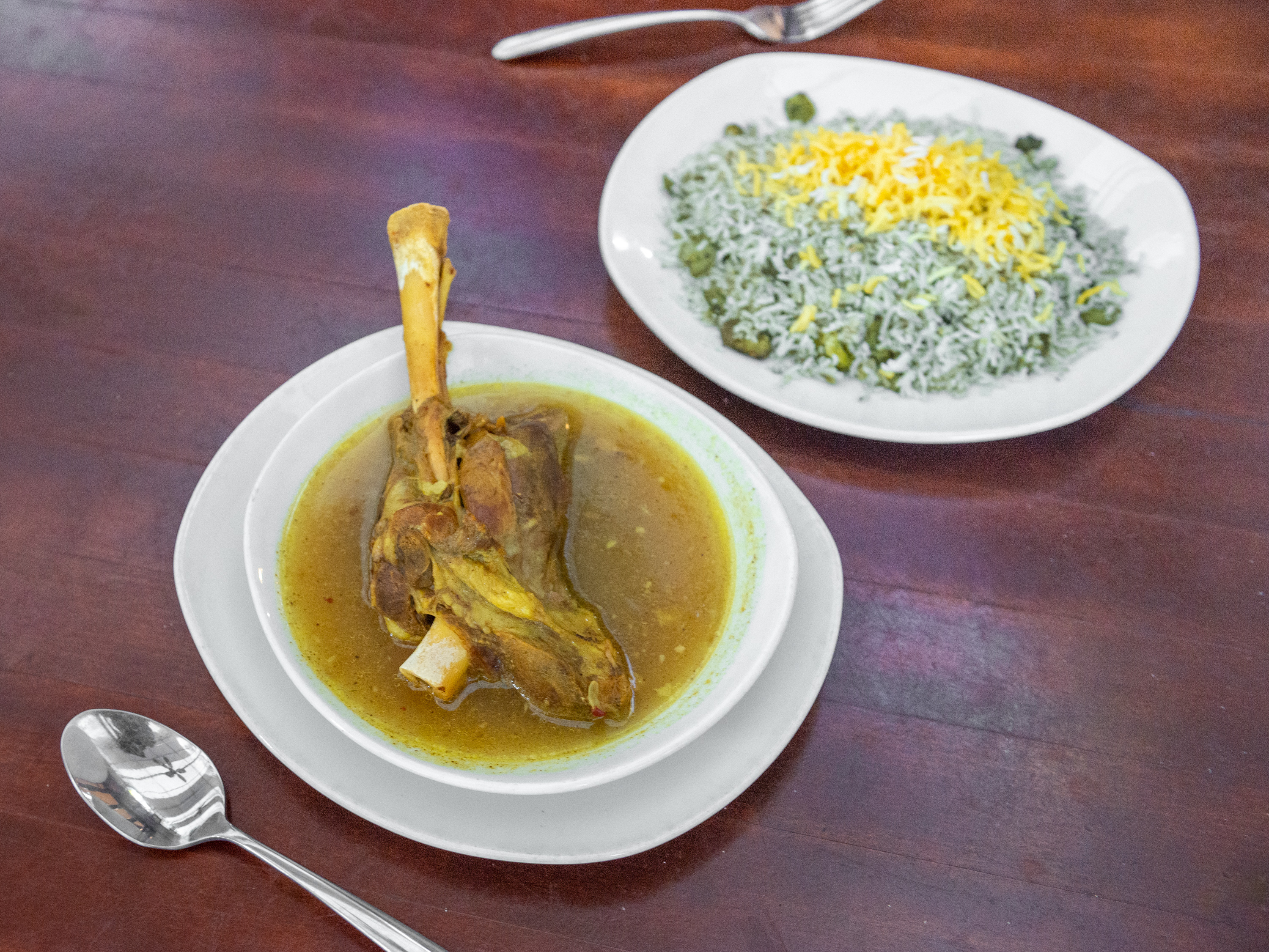 Order Lamb Shank Dish Dinner food online from Sufis: A Taste Of Persia store, Atlanta on bringmethat.com