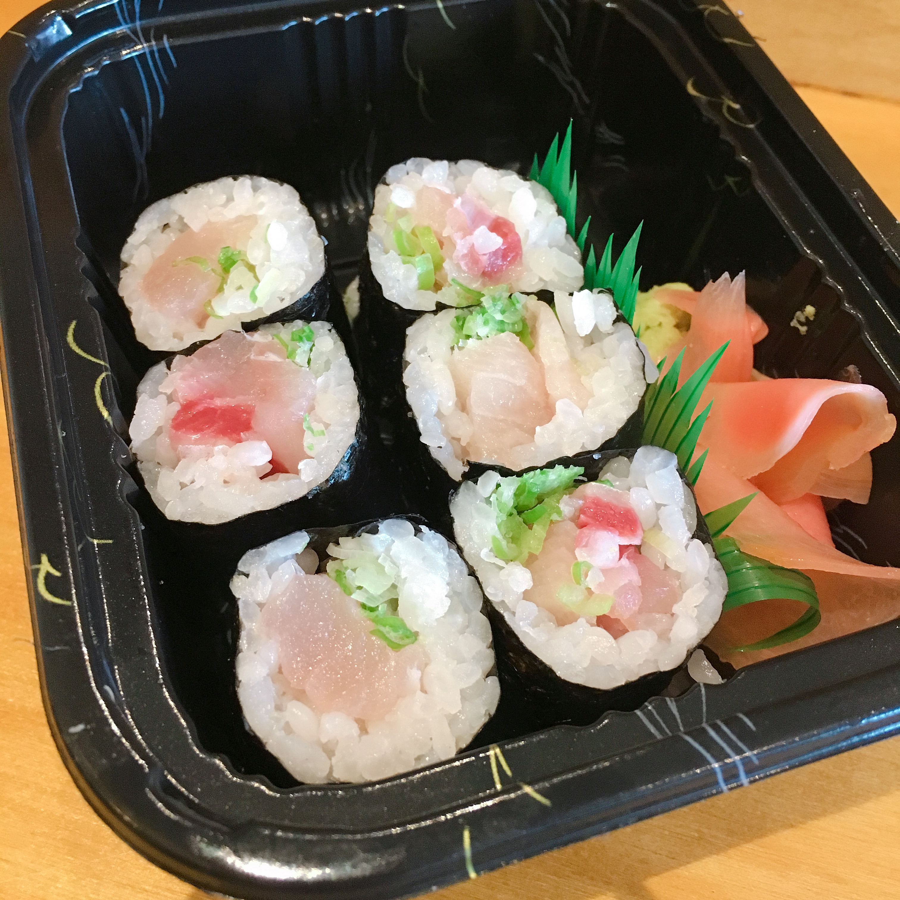 Order Yellowtail Maki with Scallion food online from Fish market sushi bar store, Allston on bringmethat.com