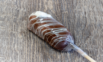 Order Dipped Twinky -Milk Chocolate food online from Rocky Mountain Chocolate Factory store, Logan on bringmethat.com