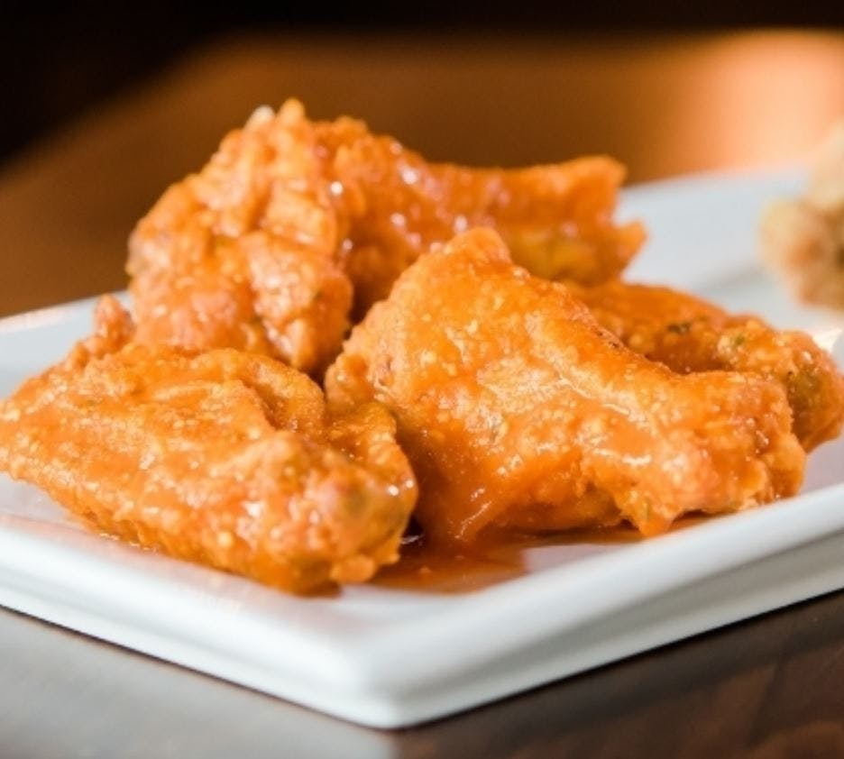 Order Wings - 10 Pieces food online from Jonny Pizza store, Fort Worth on bringmethat.com