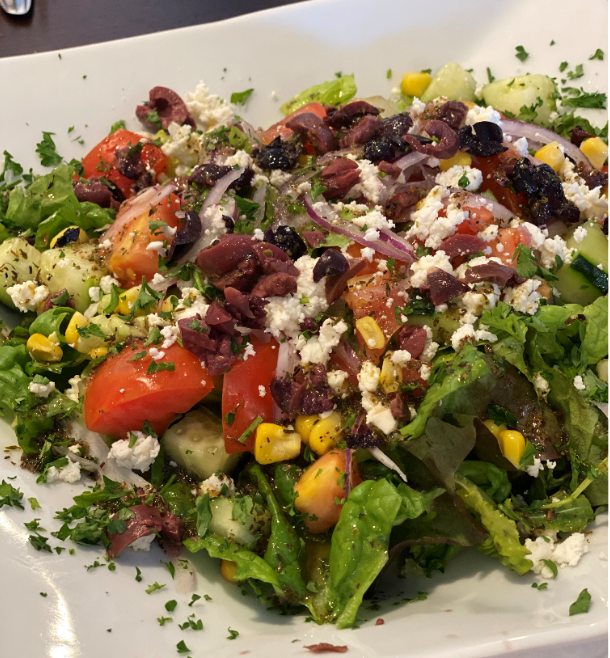 Order Greek Salad food online from Off The Boat Fish Grill store, Tustin on bringmethat.com