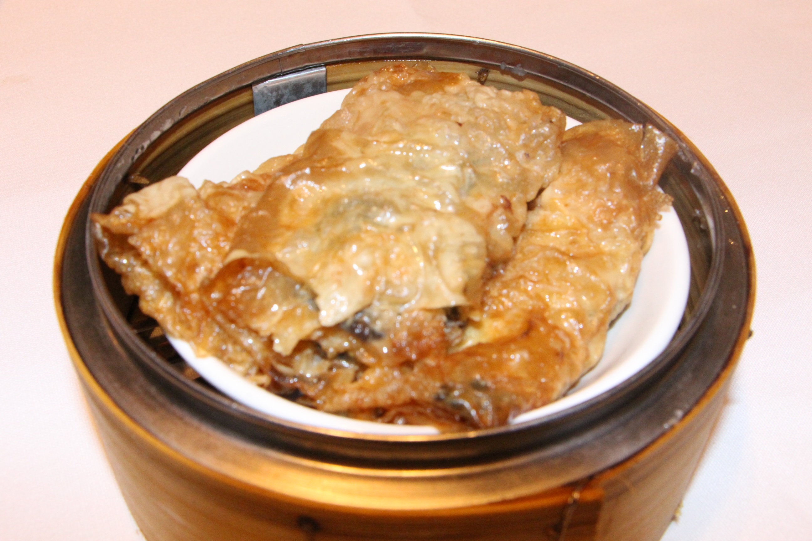 Order Ds7. Stuffed Bean Curd Skin with Pork and Shrimp food online from Nani Restaurant store, Madison on bringmethat.com