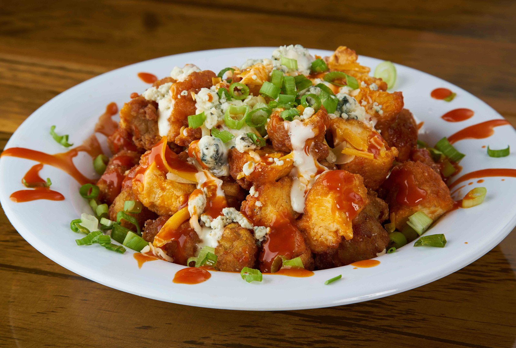 Order Kick'N Chicken Tater Tots food online from Hurricane Grill & Wings store, Newburgh on bringmethat.com