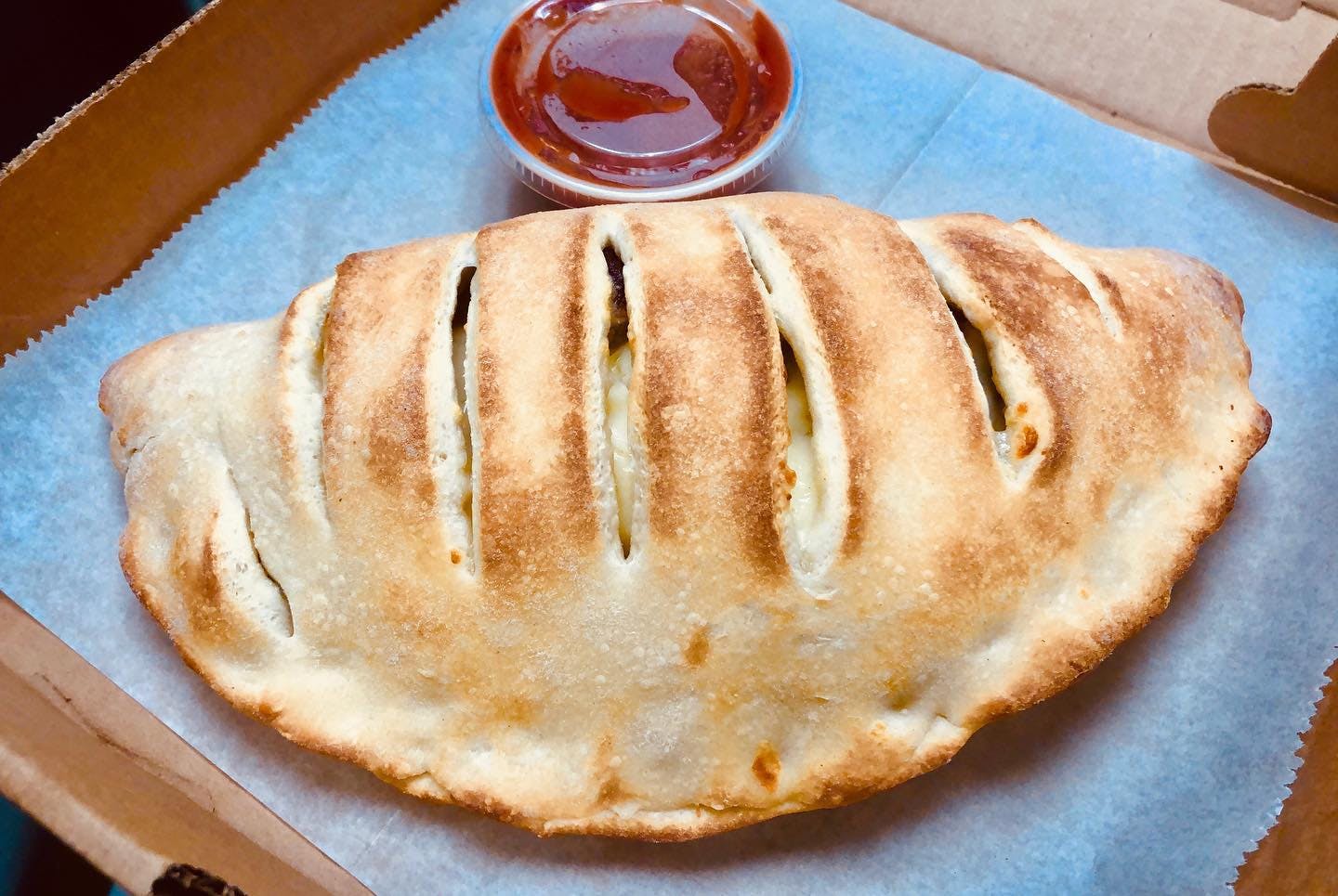 Order Cheese Calzone - Calzone food online from Milanos Pizza store, Providence on bringmethat.com