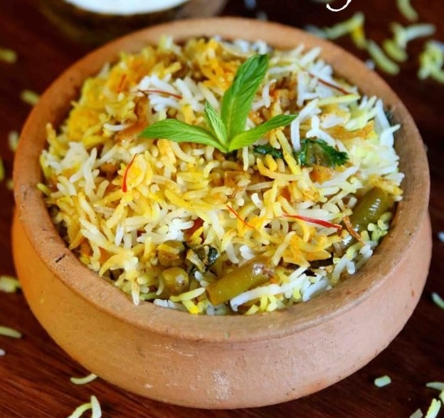 Order Seasonal Vegetatable Biryani food online from India Oven store, Roseville on bringmethat.com