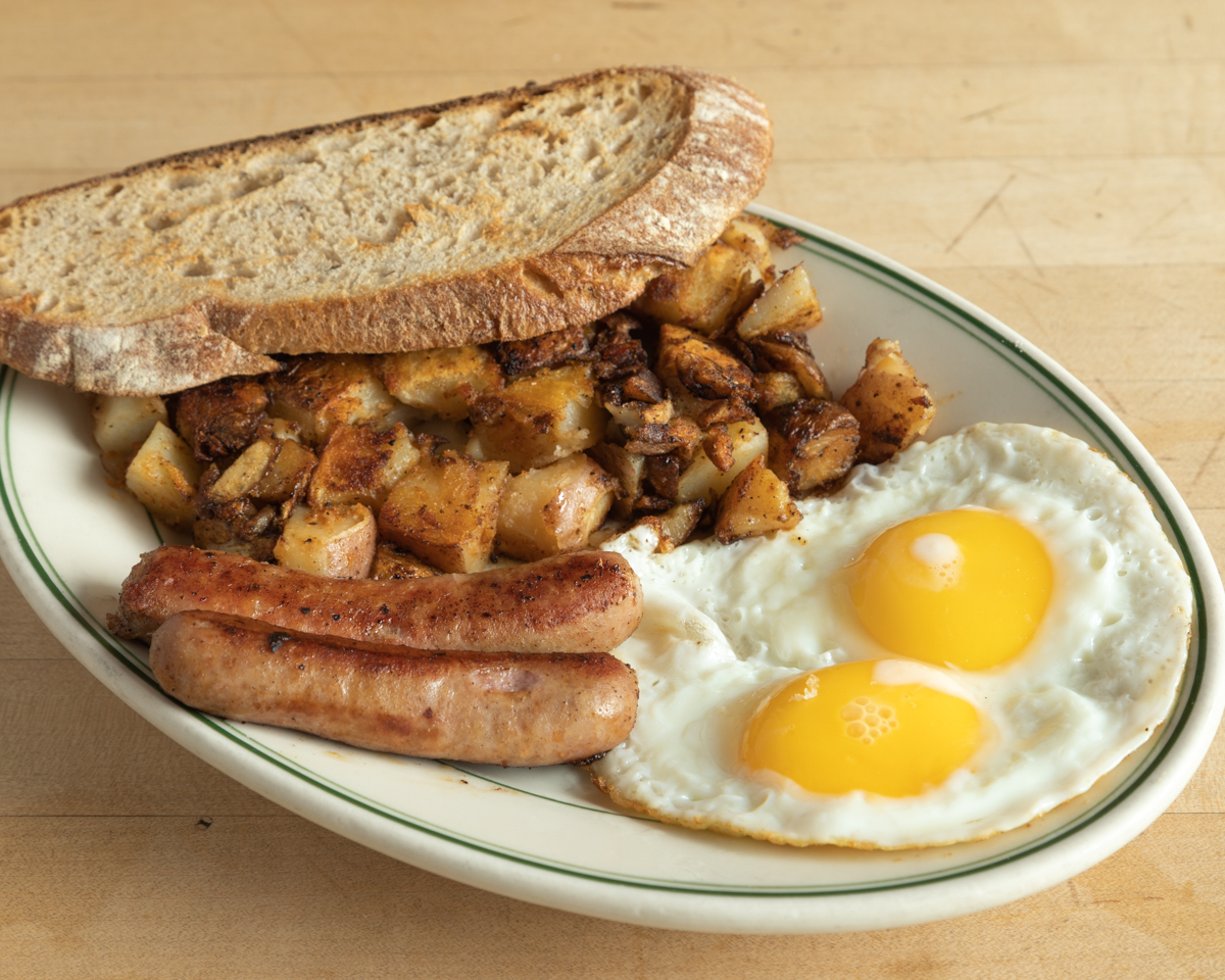 Order 2 Eggs Any Style with Link Sausage food online from Just For You Cafe store, San Francisco on bringmethat.com