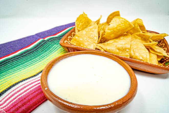 Order Cheese Dip (Queso Dip) food online from Taco Veloz store, Doraville on bringmethat.com