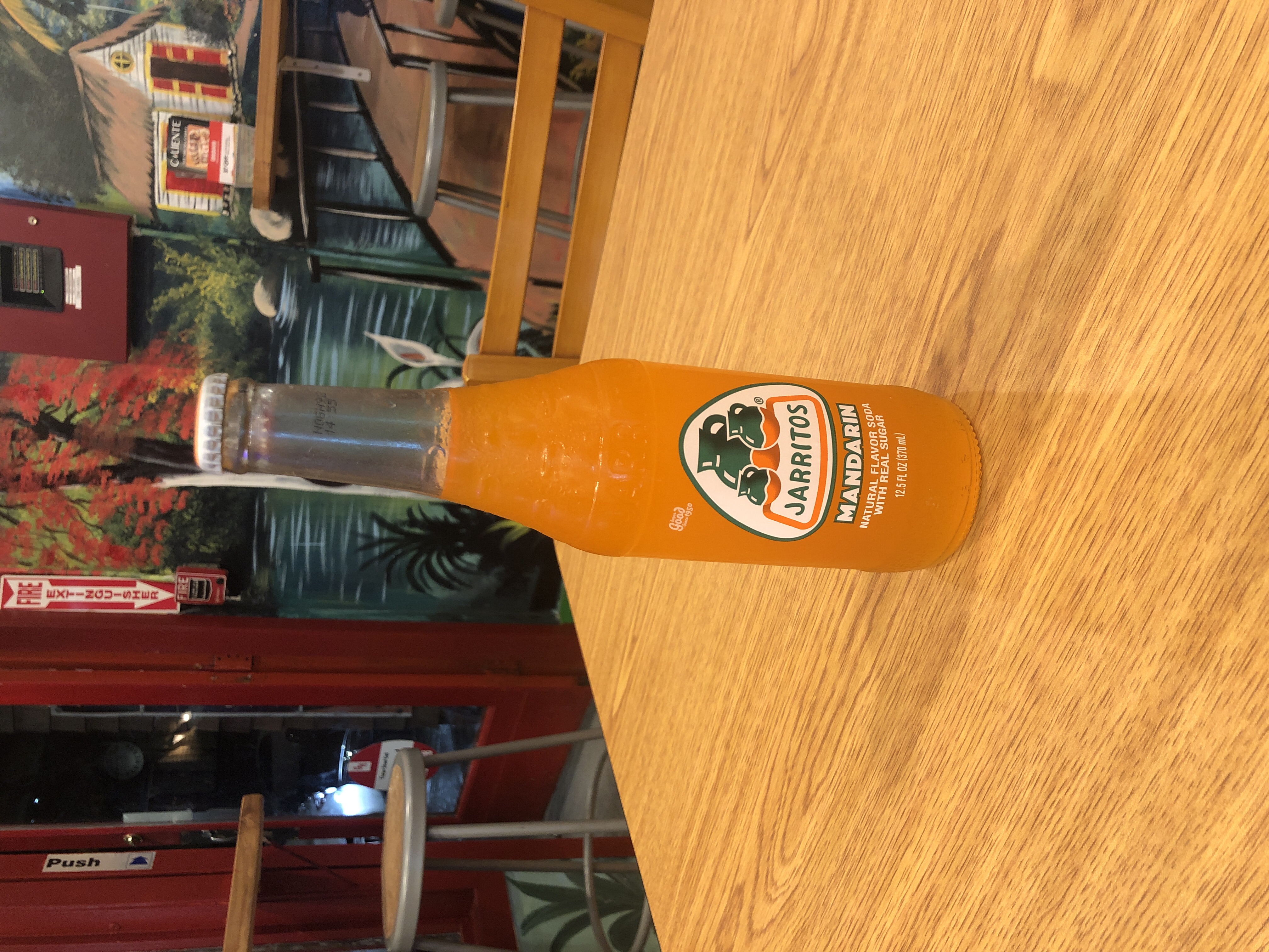 Order Mandarin jarritos  food online from Caliente Mexican store, Providence on bringmethat.com