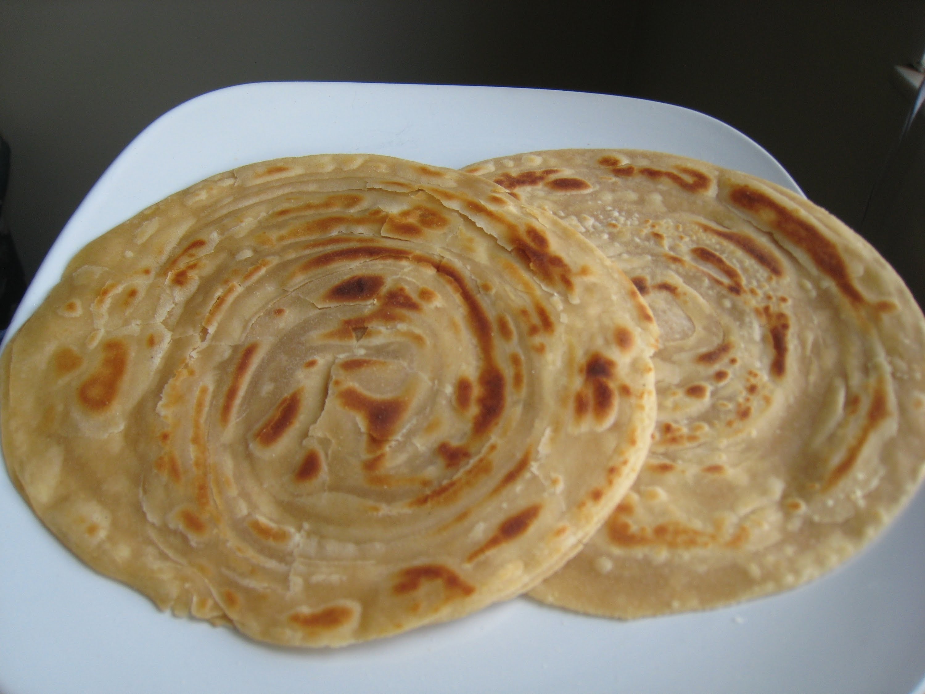 Order Paratha food online from India's Grill store, Los Angeles on bringmethat.com