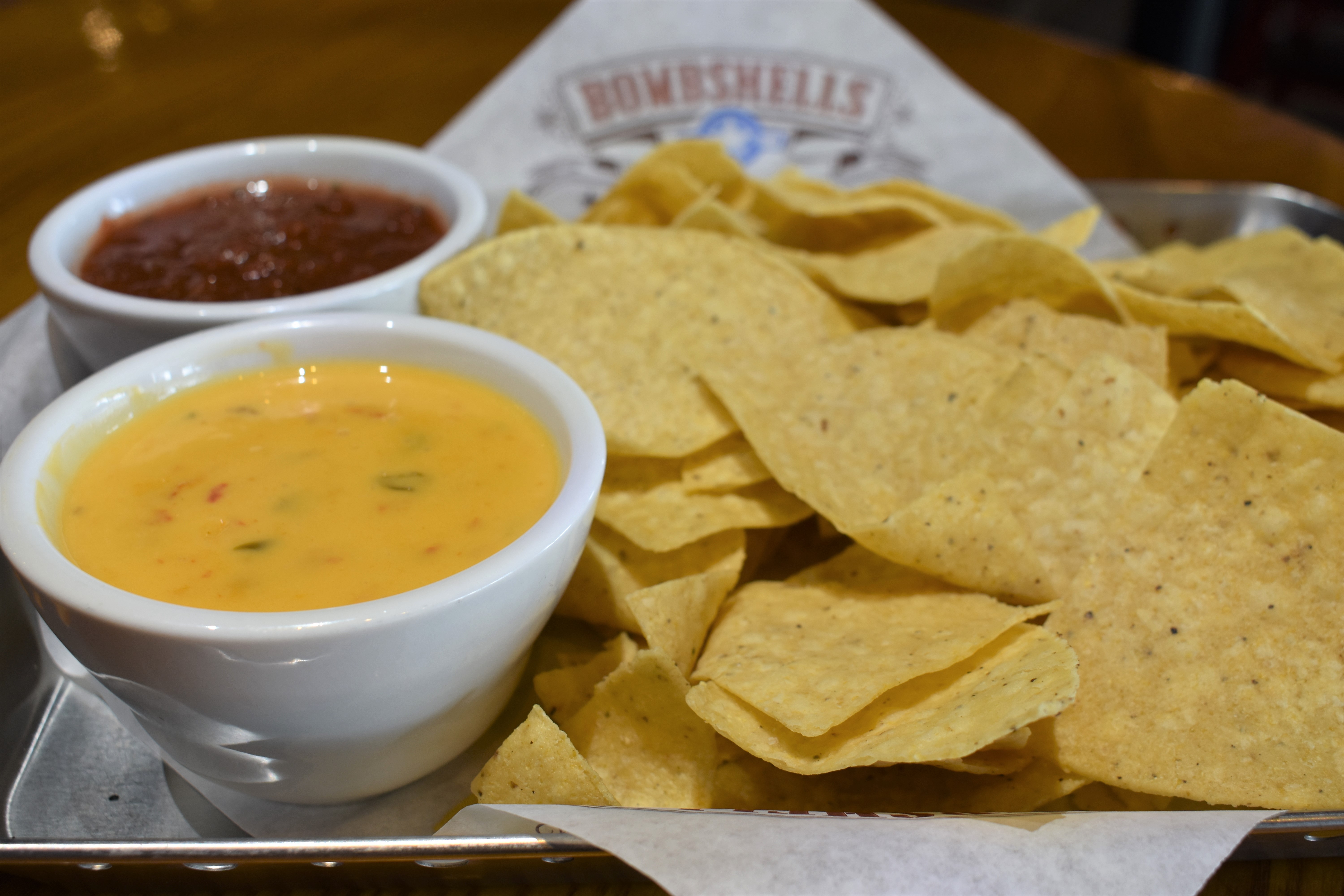 Order Chips & Queso food online from Bombshells store, Houston on bringmethat.com