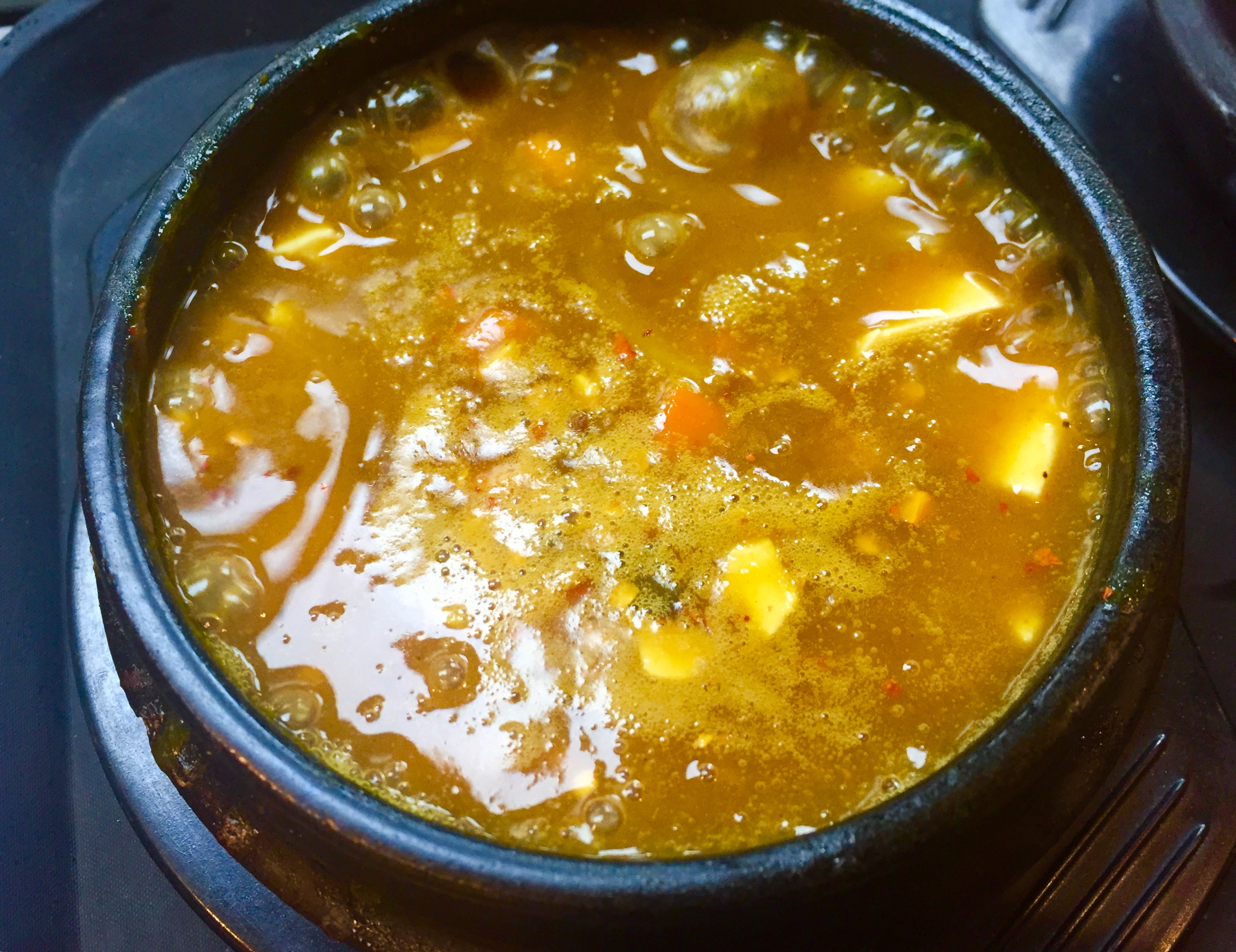 Order T16. Curry Tofu Soup food online from Jang Guem Tofu & Bbq store, Sugar Land on bringmethat.com