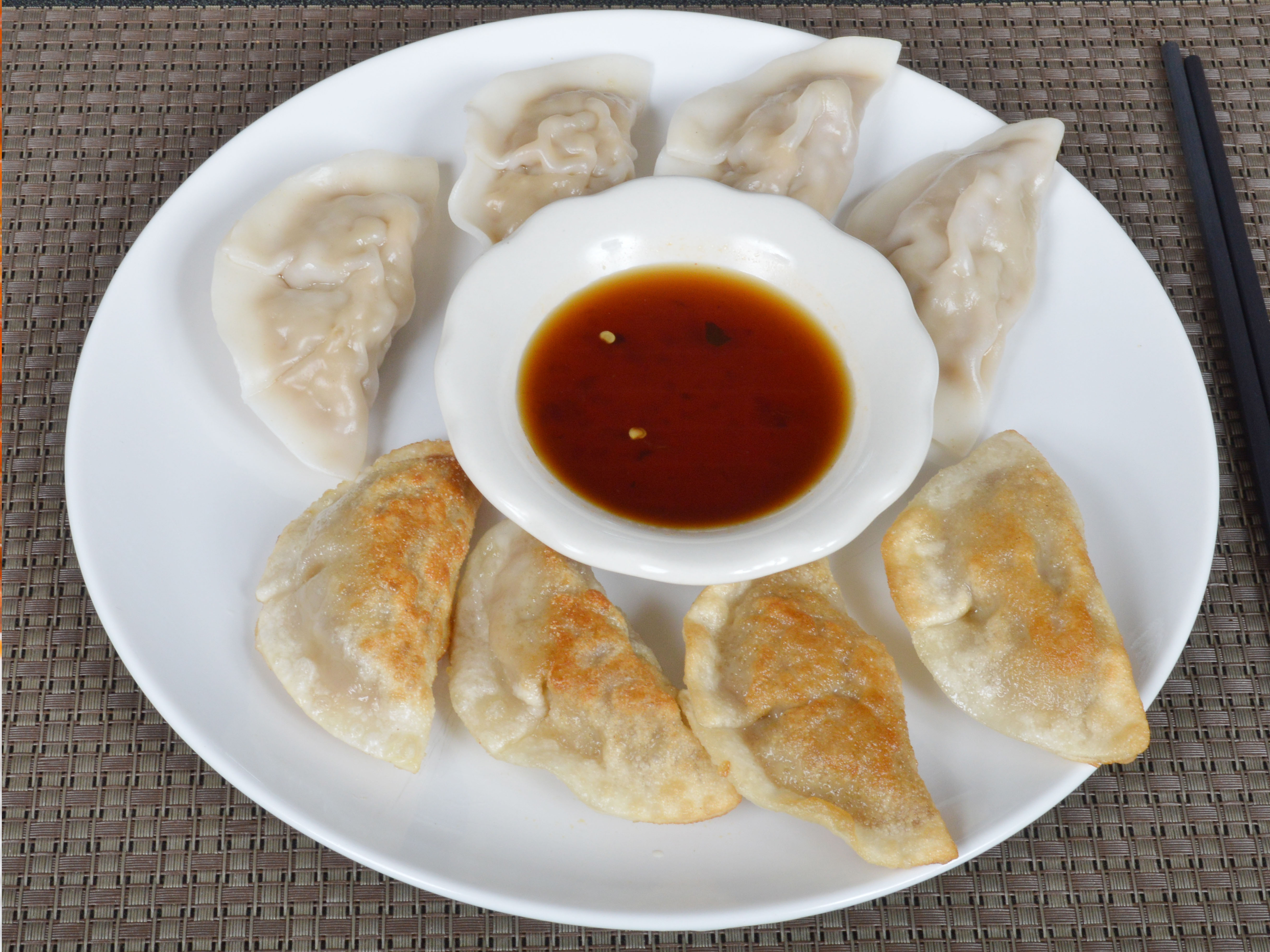 Order 3. Steamed Dumpling food online from Hing Wah Chinese Restaurant store, Hamden on bringmethat.com