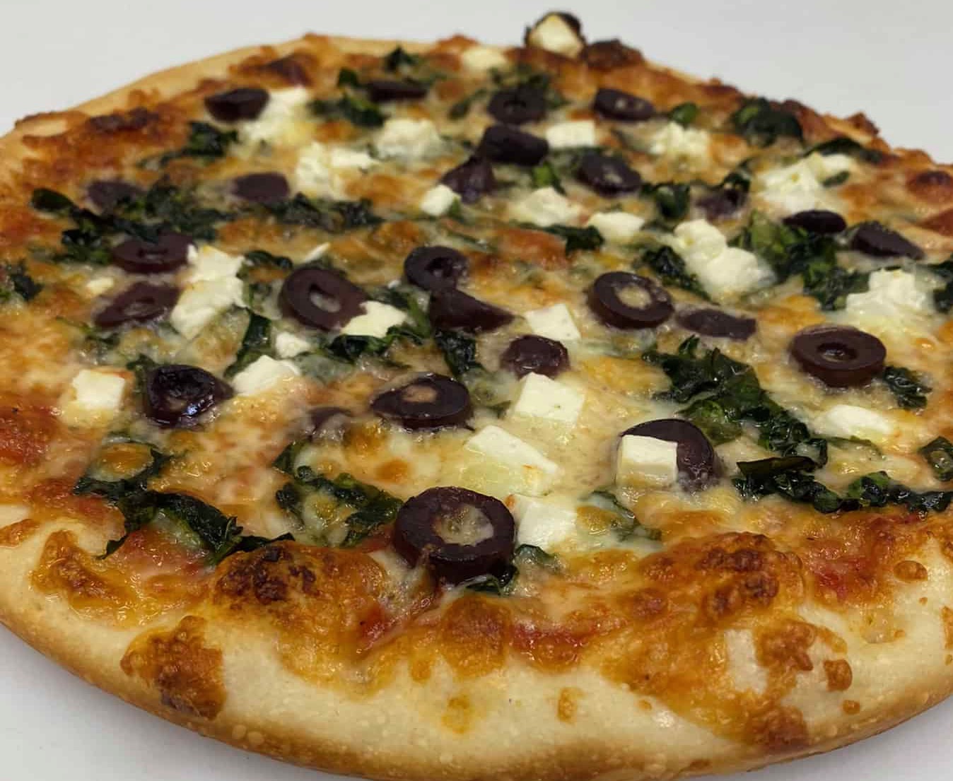 Order 18" Greek Pie food online from Famous Pizza store, Paramus on bringmethat.com