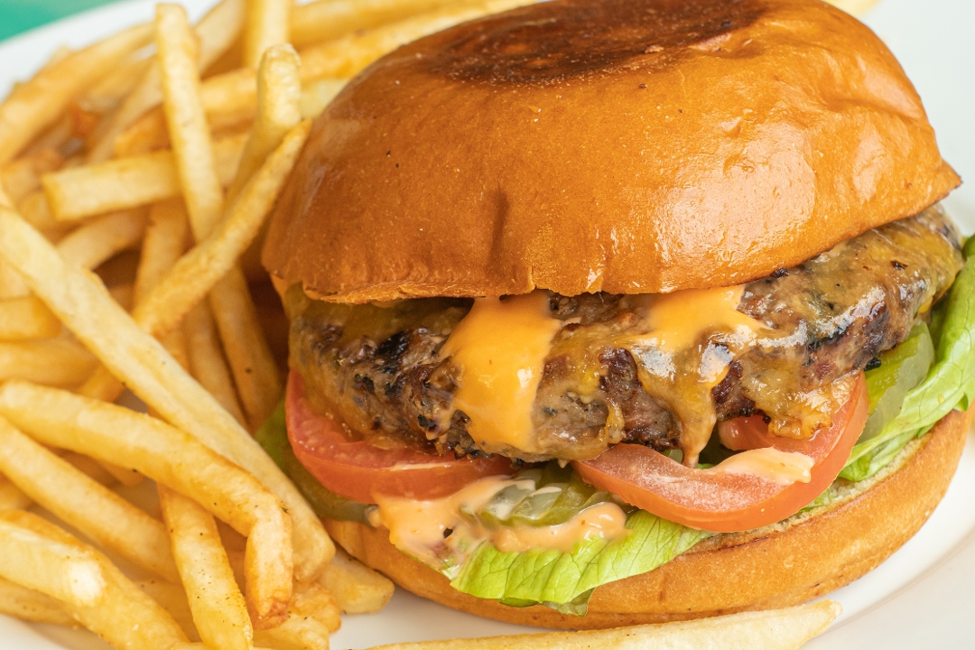 Order All-American Burger food online from Monkey Business Cafe store, Fullerton on bringmethat.com