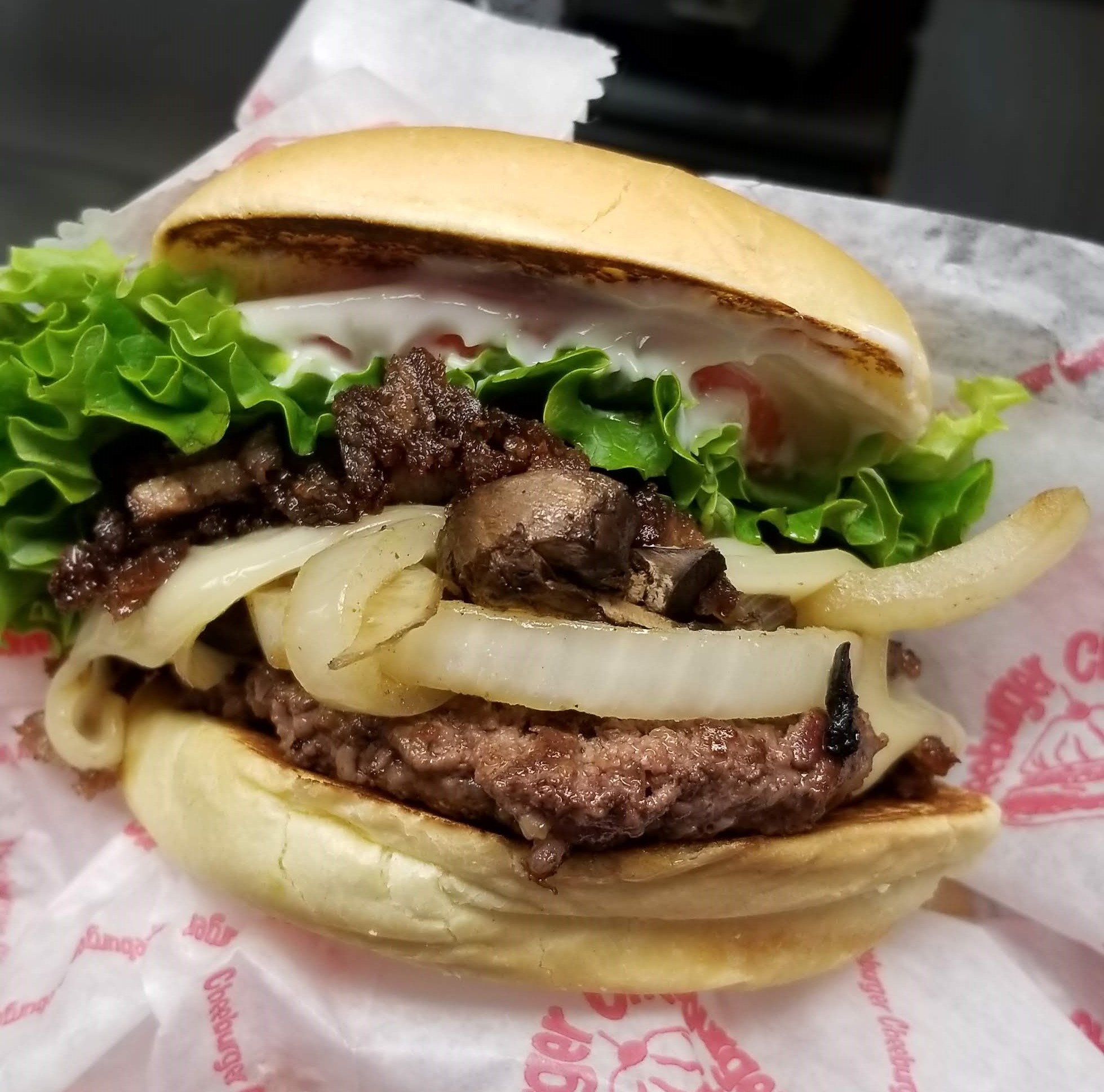 Order Philly Steak Burger food online from Cheeburger Cheeburger store, Buffalo on bringmethat.com