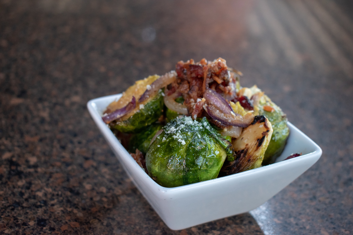 Order Bacon Brussel Sprouts Seared Bacon, Red Onion, Grated food online from RnR store, Scottsdale on bringmethat.com