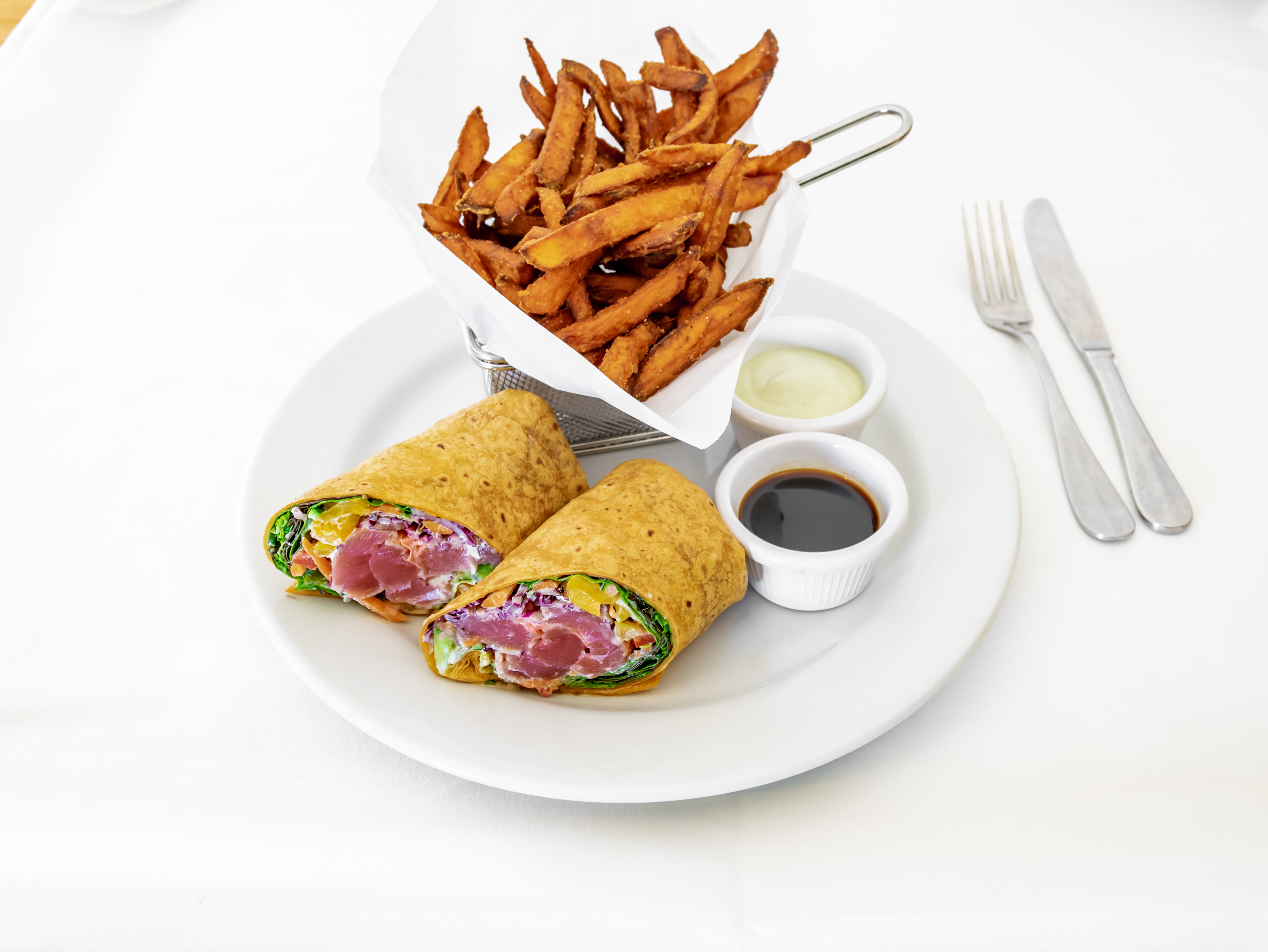 Order 1. Yellowfin Ahi Tuna Wrap Dinner food online from Nero's Grille store, Livingston on bringmethat.com