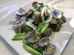 Order G12. Sauteed Clams with Onion & Ginger 葱姜炒蛤蜊 food online from Garage Restaurant store, San Gabriel on bringmethat.com