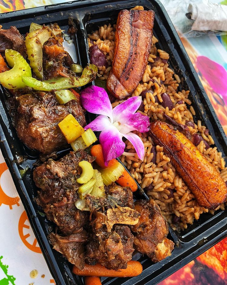 Order Oxtails with Creole Rice food online from Cocobreeze store, Oakland on bringmethat.com