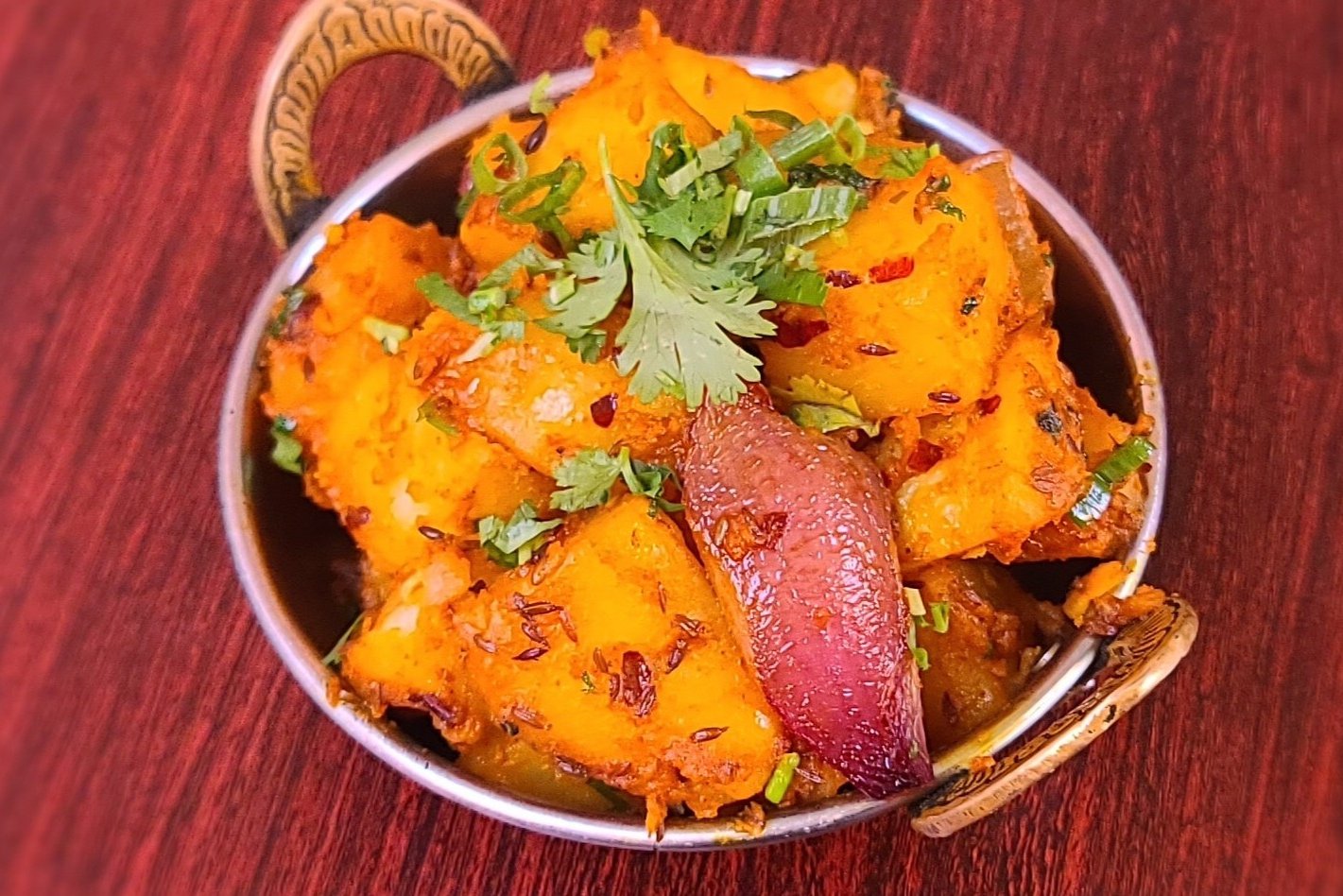 Order Jeera Aloo food online from Om Indian Cuisine store, San Francisco on bringmethat.com