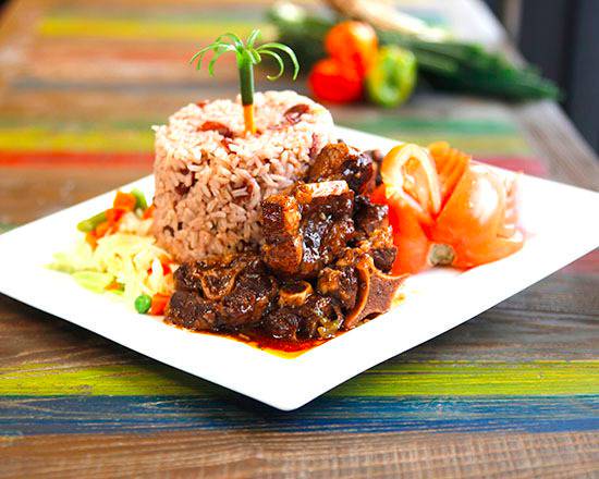 Order OXTAIL MEAL food online from Jerk House Caribbean Restaurant store, New York on bringmethat.com