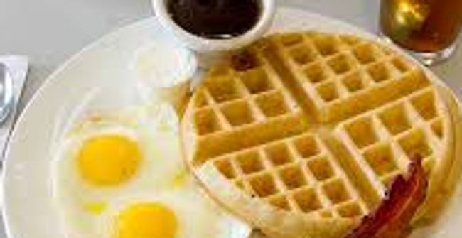 Order Belgian Waffle with 2 Eggs Any Style food online from Kellogg's diner store, Brooklyn on bringmethat.com