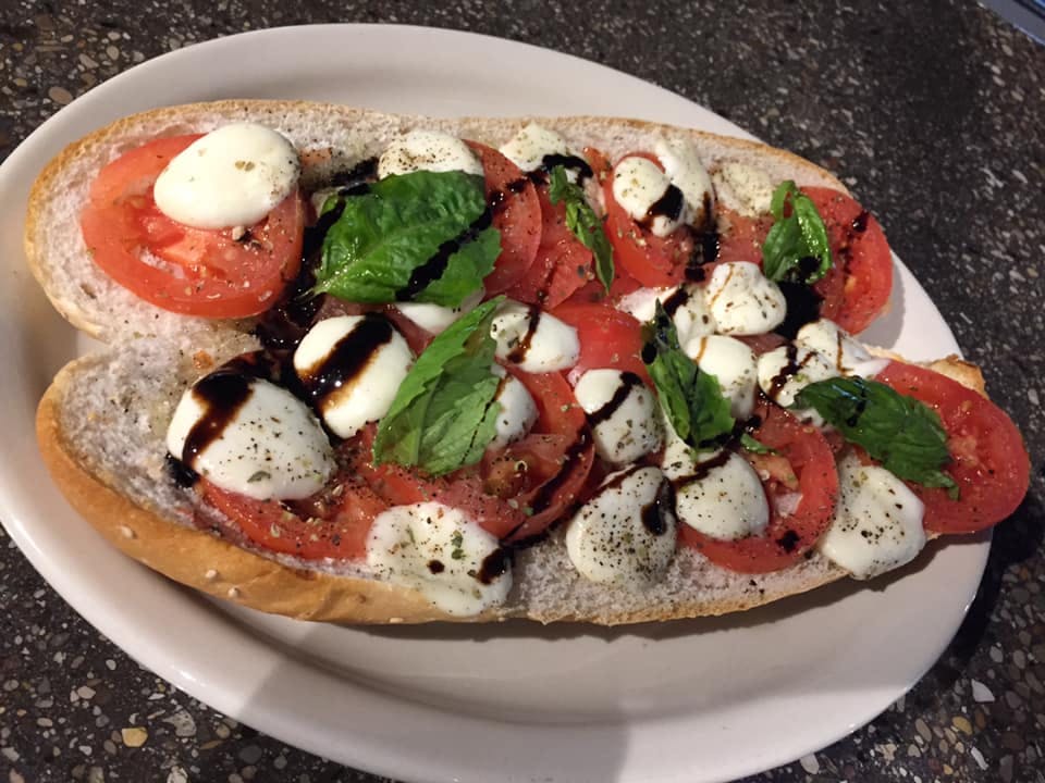 Order The Caprese Sub - Sub food online from Freds Pizza & Italian Restaurant store, Grand Rapids on bringmethat.com