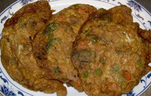 Order 60. Vegetable Egg Foo Young  food online from Good Taste Restaurant store, Ramsey on bringmethat.com