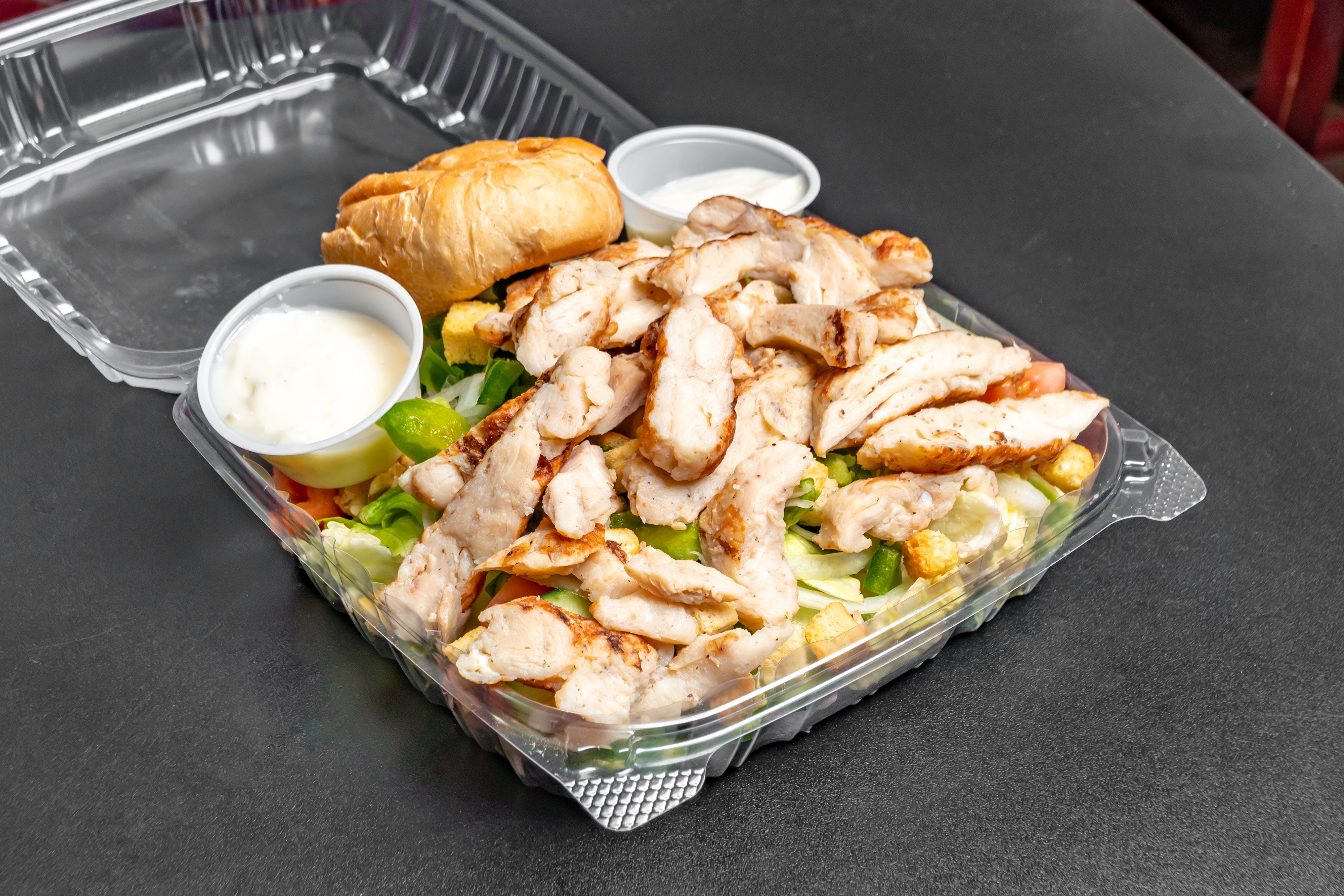 Order Grilled Chicken Salad - Salad food online from Starvin Marvin Pizza store, Gaithersburg on bringmethat.com