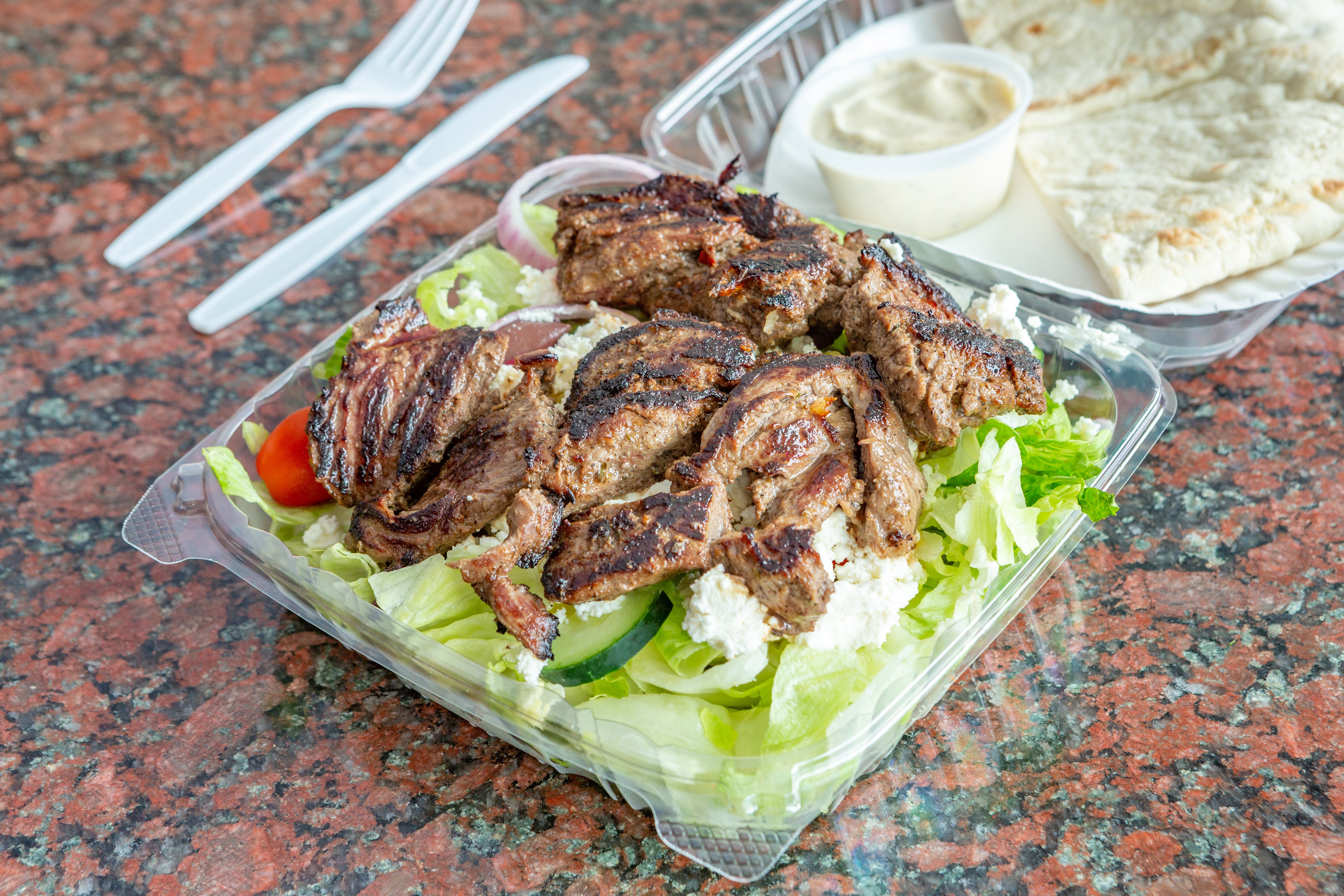Order Char Grilled Sirloin Tips Salad - Salad food online from Theo's Pizzeria & Grill - Belmont store, Belmont on bringmethat.com