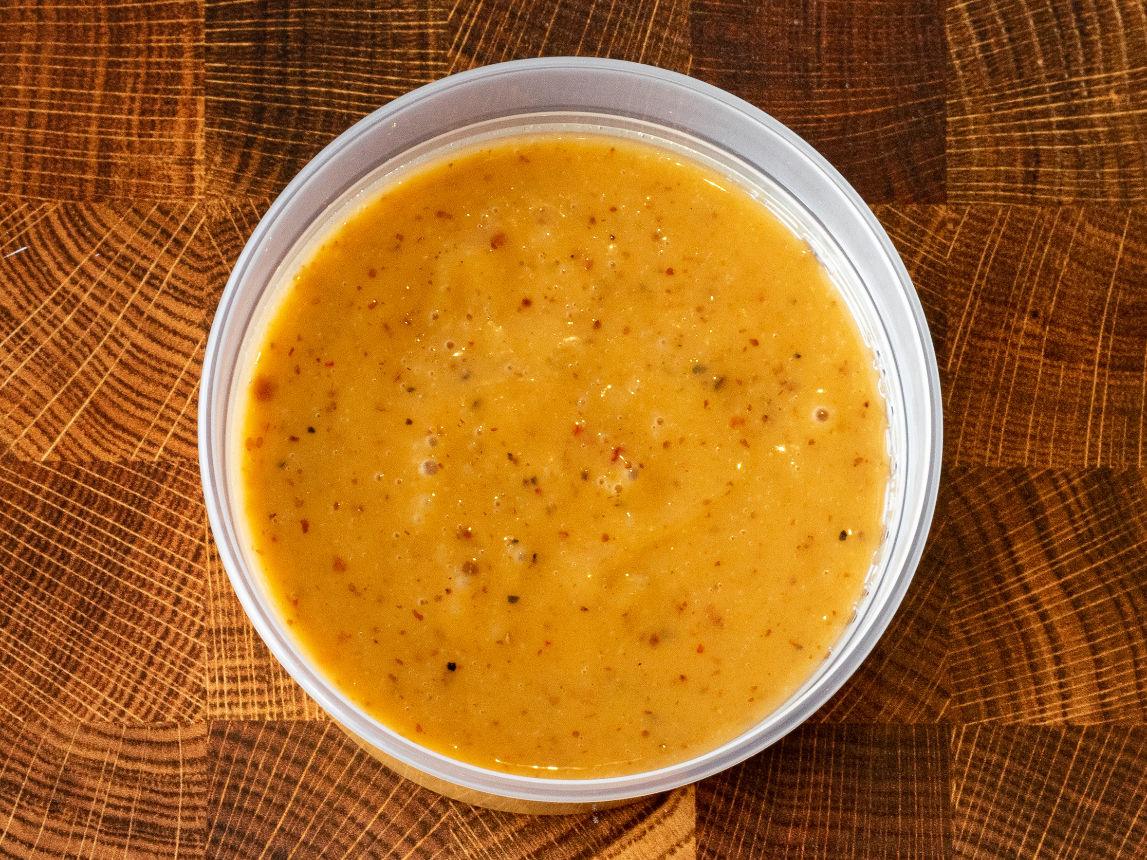 Order 8 oz. Mango-Pineapple Vinaigrette food online from Cabo Fresh Mexican Grill store, Stony Brook on bringmethat.com