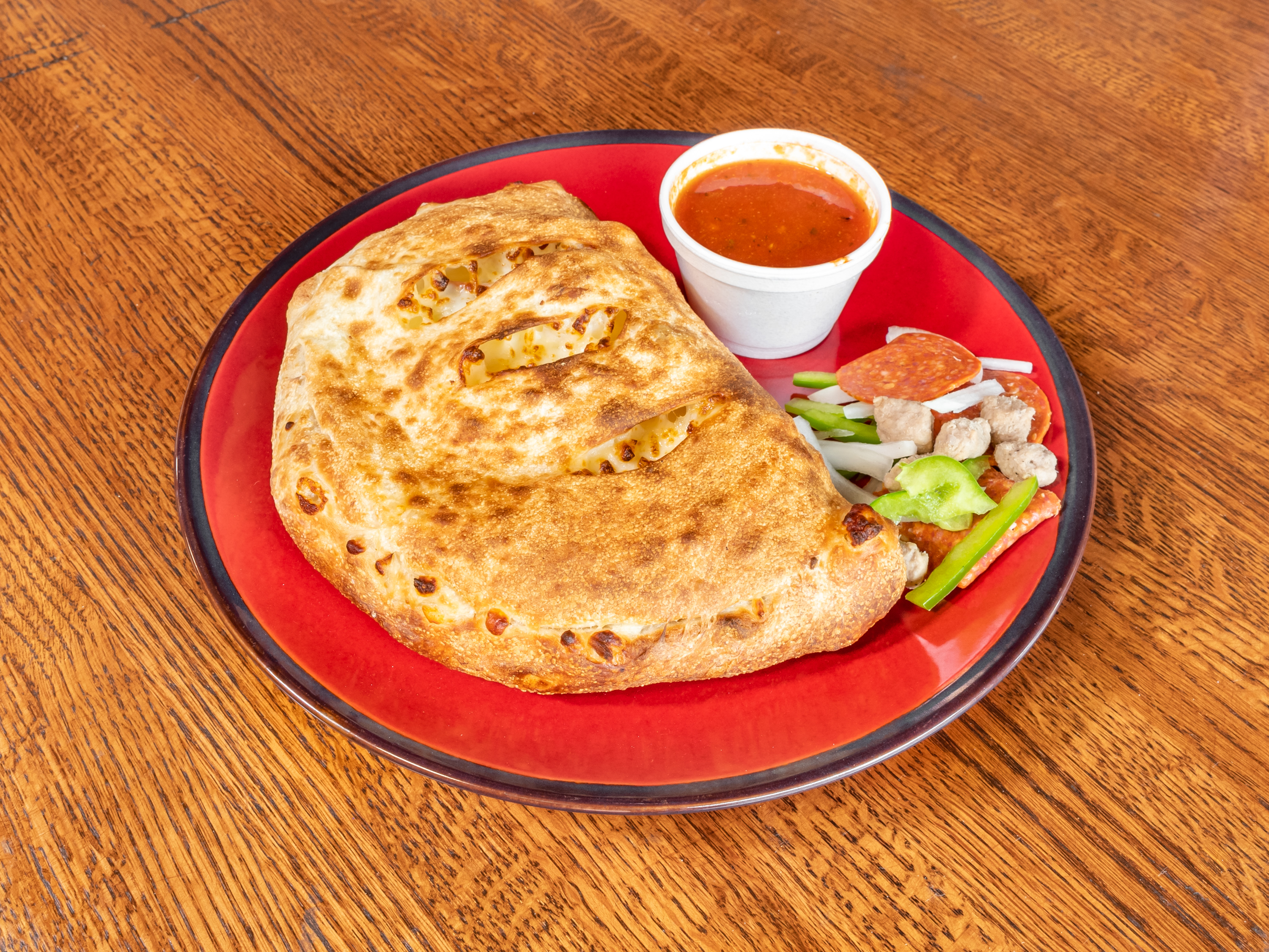 Order Super Calzone food online from Mama Mia's Pizza store, Denver on bringmethat.com