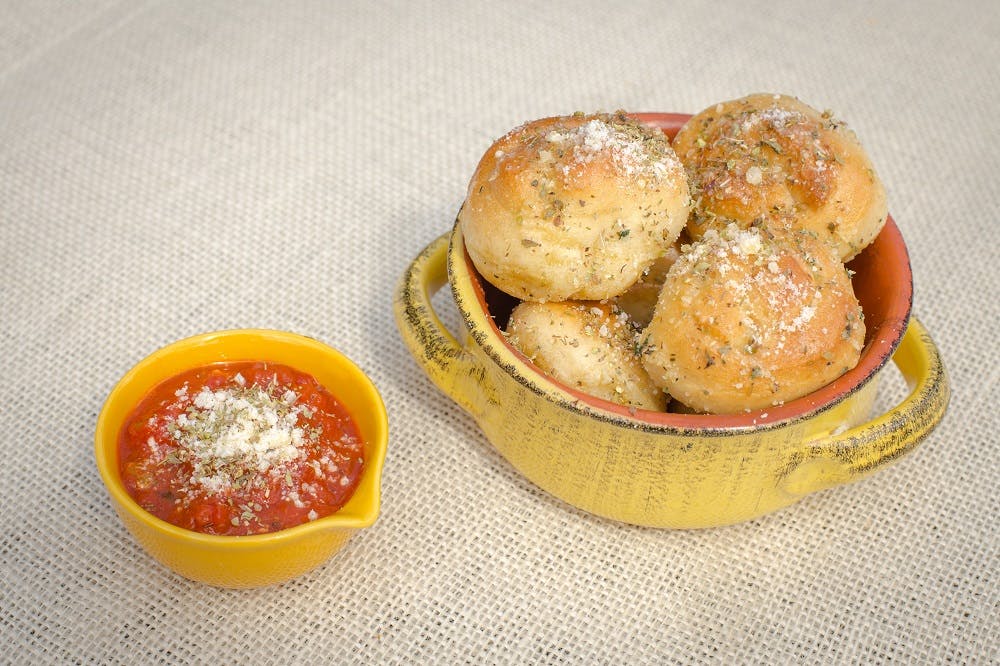 Order Garlic Knots - 5 Pieces food online from La Casa De Pizzeria store, Troy on bringmethat.com