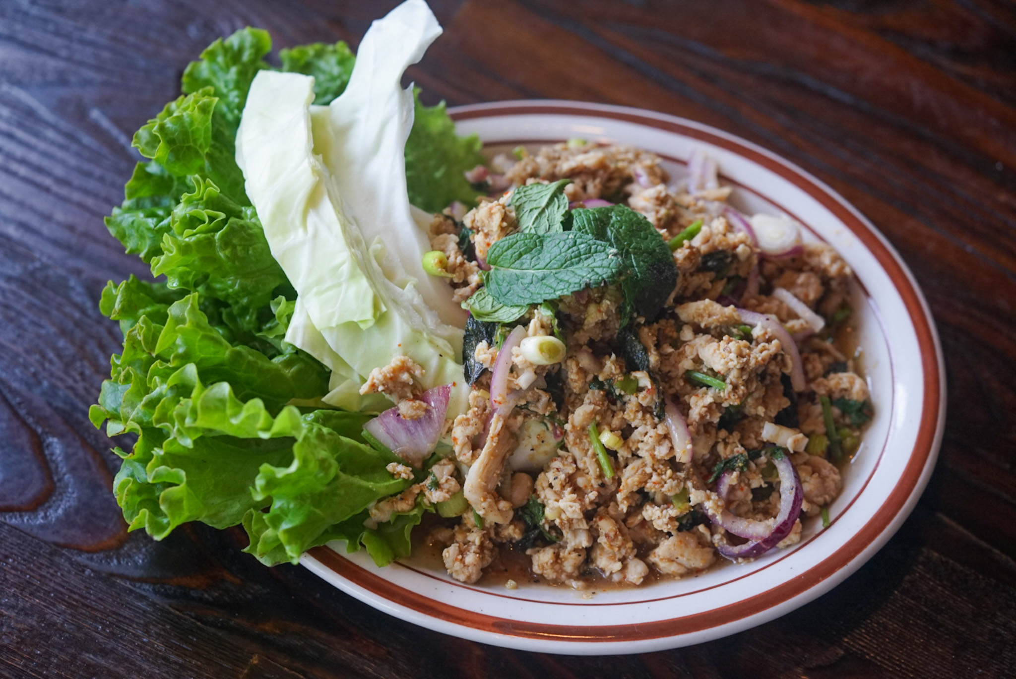 Order Laab Spicy Salad with Chicken food online from Chao Krung store, Los Angeles on bringmethat.com