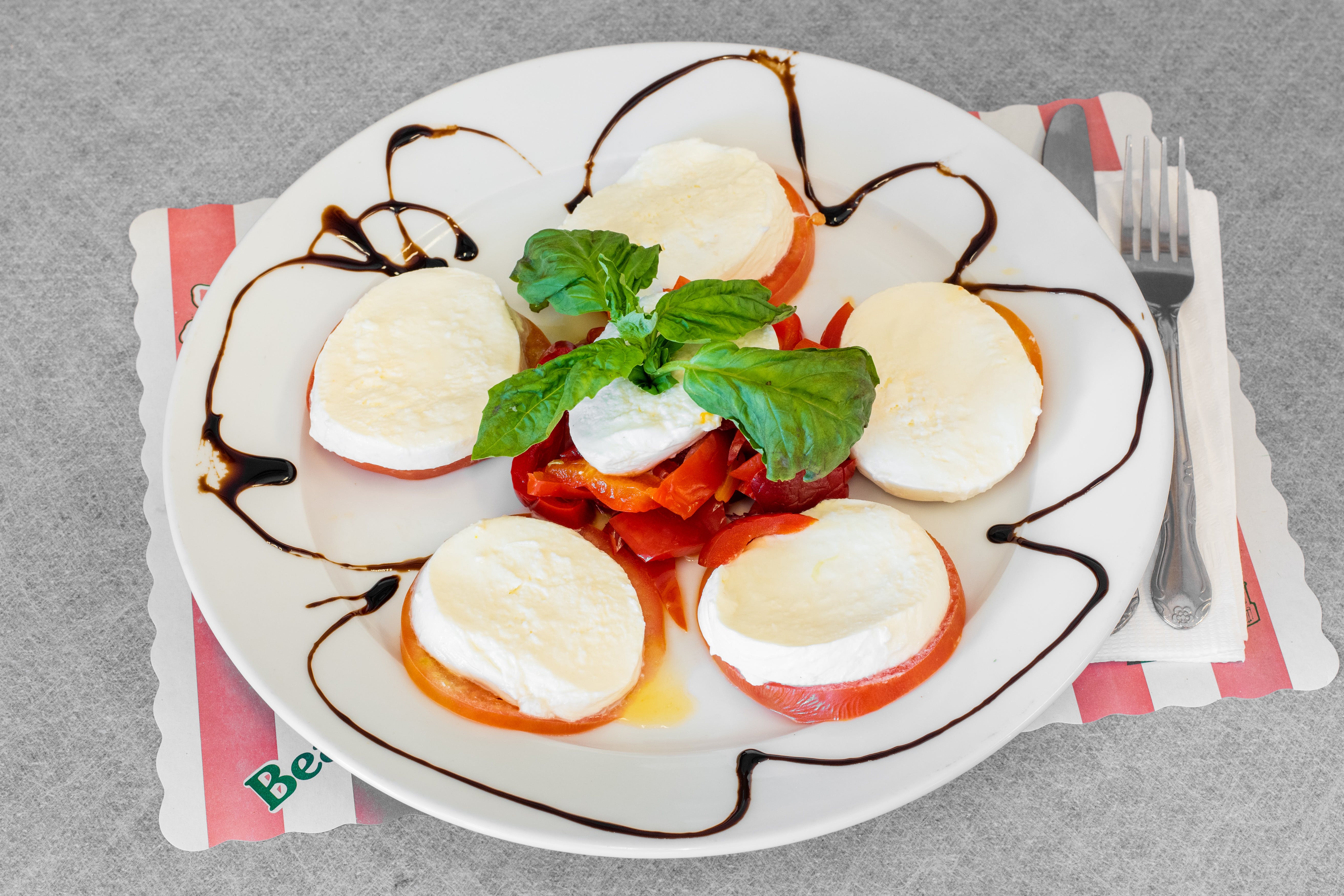 Order Roasted Peppers & Fresh Mozzarella Salad - Salad food online from Emilios Restaurant & Pizzeria store, Manalapan Township on bringmethat.com