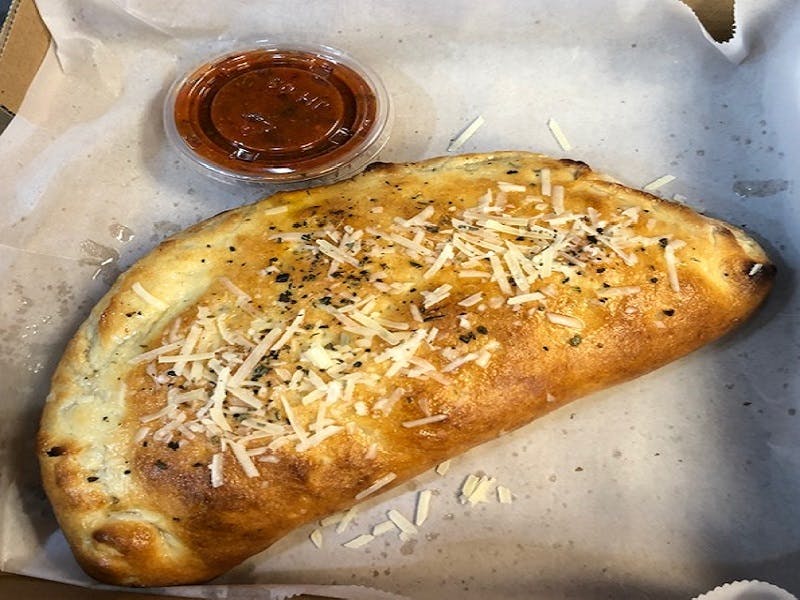 Order Calzone - Small food online from Pizza World store, North Las Vegas on bringmethat.com