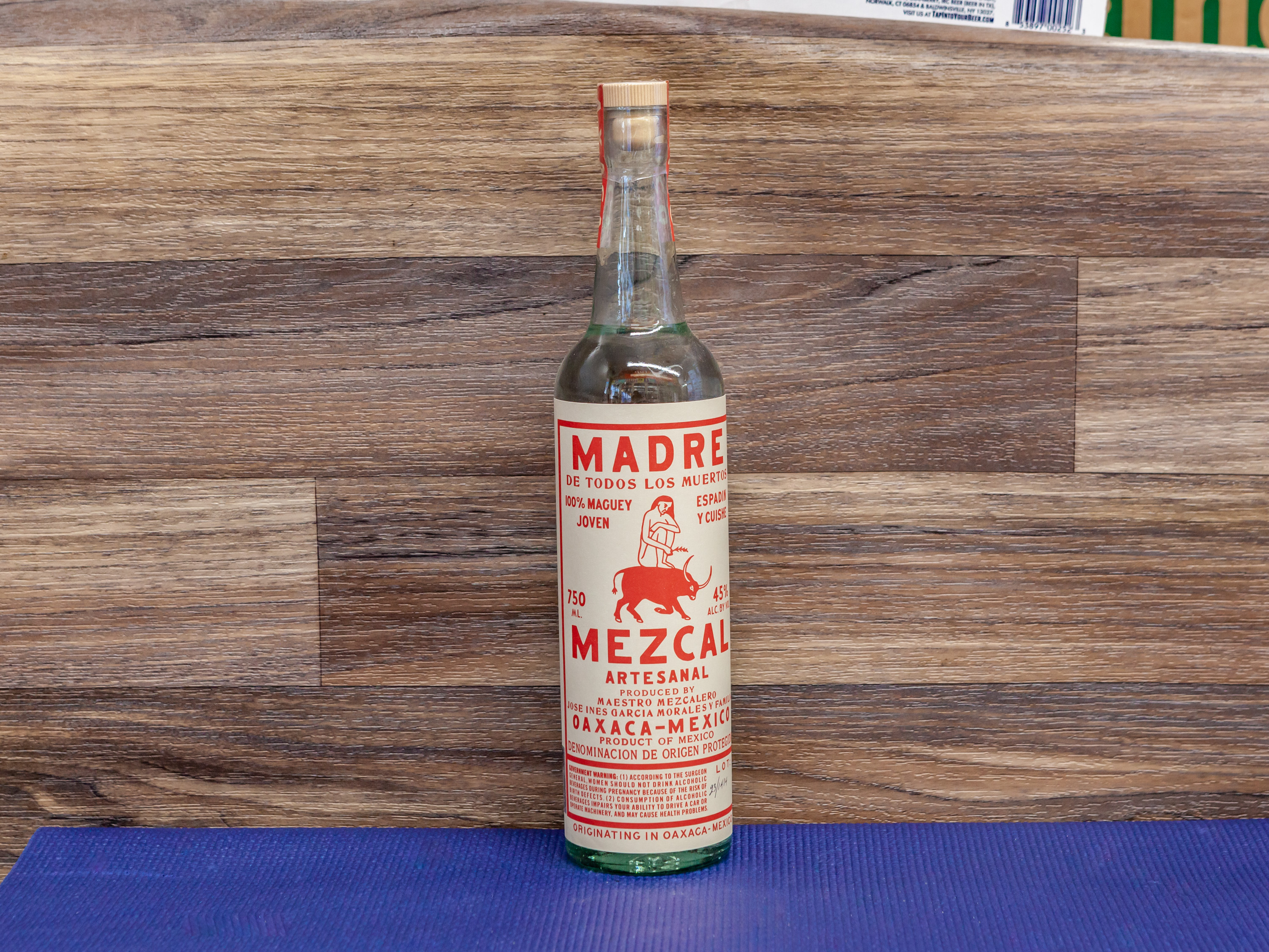 Order Madre Mezcal, 750 ml. Tequila, 45.0% ABV food online from Day & Night Liquor & Market store, Venice on bringmethat.com