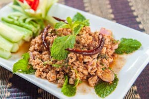 Order Larb (Traditional Spicy Chicken Salad) food online from The Elephant Geneva store, Geneva on bringmethat.com