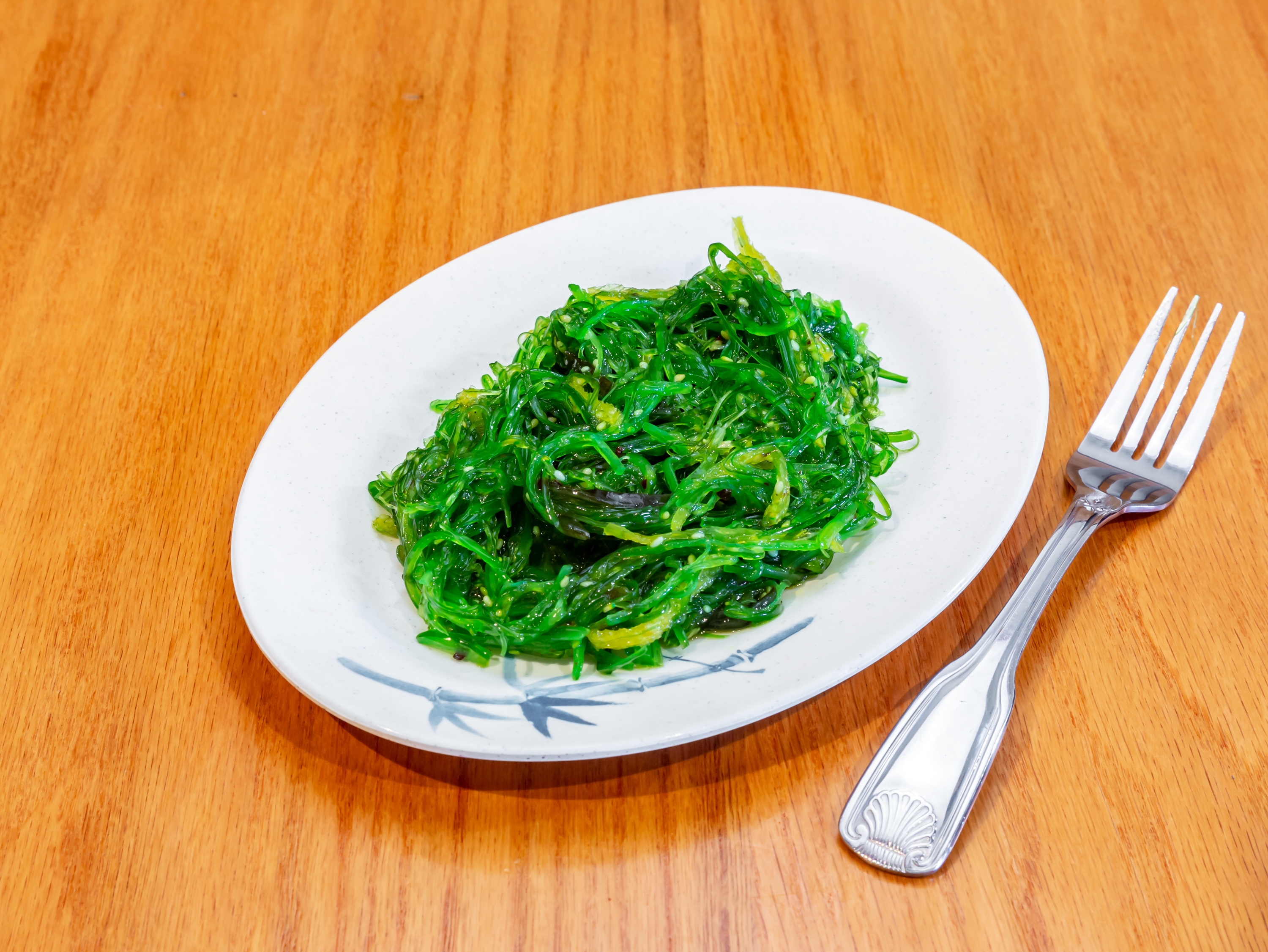Order Seaweed Salad food online from W’Lins Asian Cuisine &Spirits store, Spring Hill on bringmethat.com
