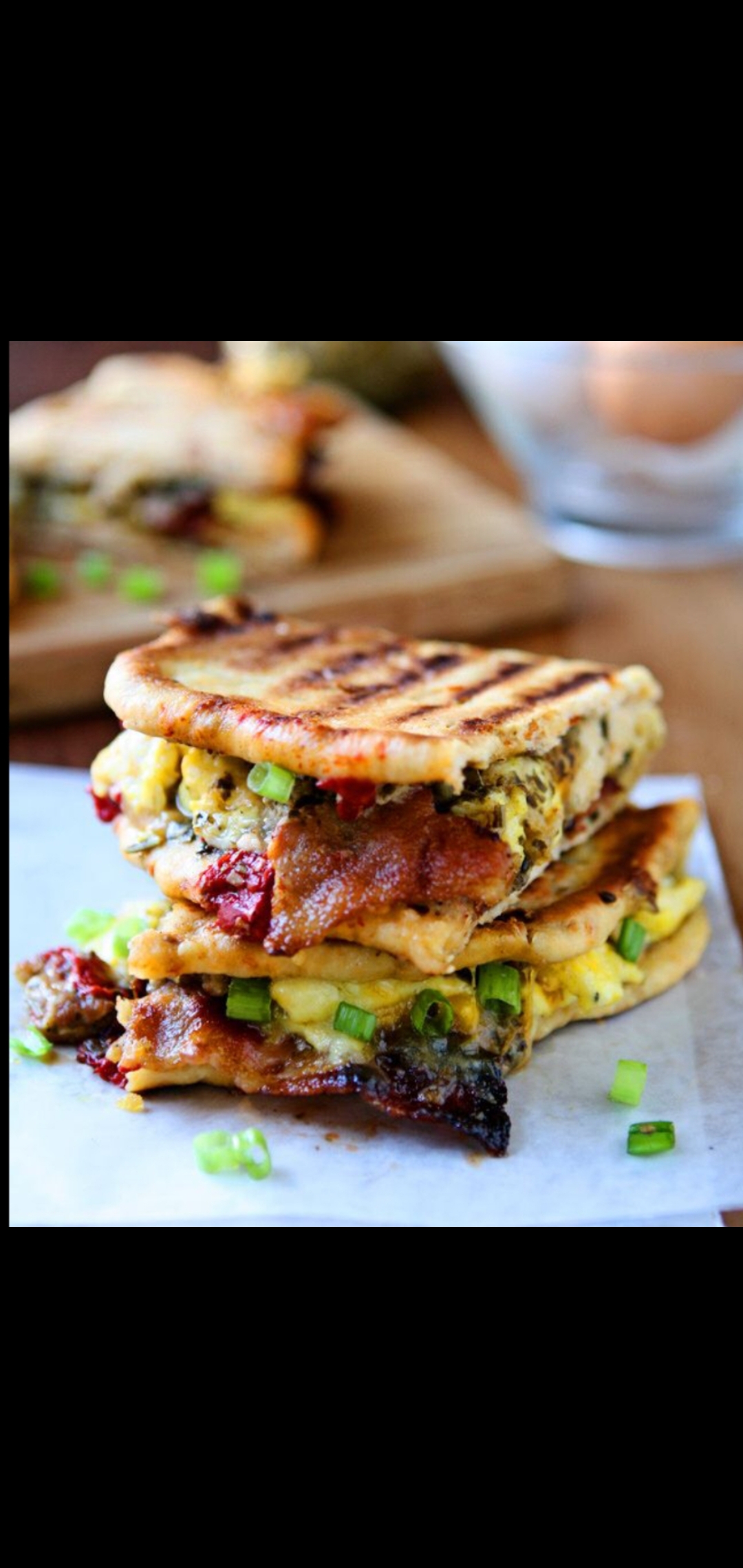 Order Panini Breakfast Special Sandwich (eggs cheese sausage peppers green onions bacon & pesto sauce  food online from American Gourmet Foods Deli store, New York on bringmethat.com