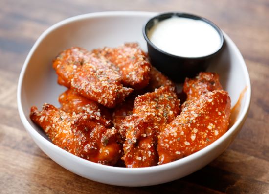 Order Wings food online from Pizanos Pizza store, Reno on bringmethat.com