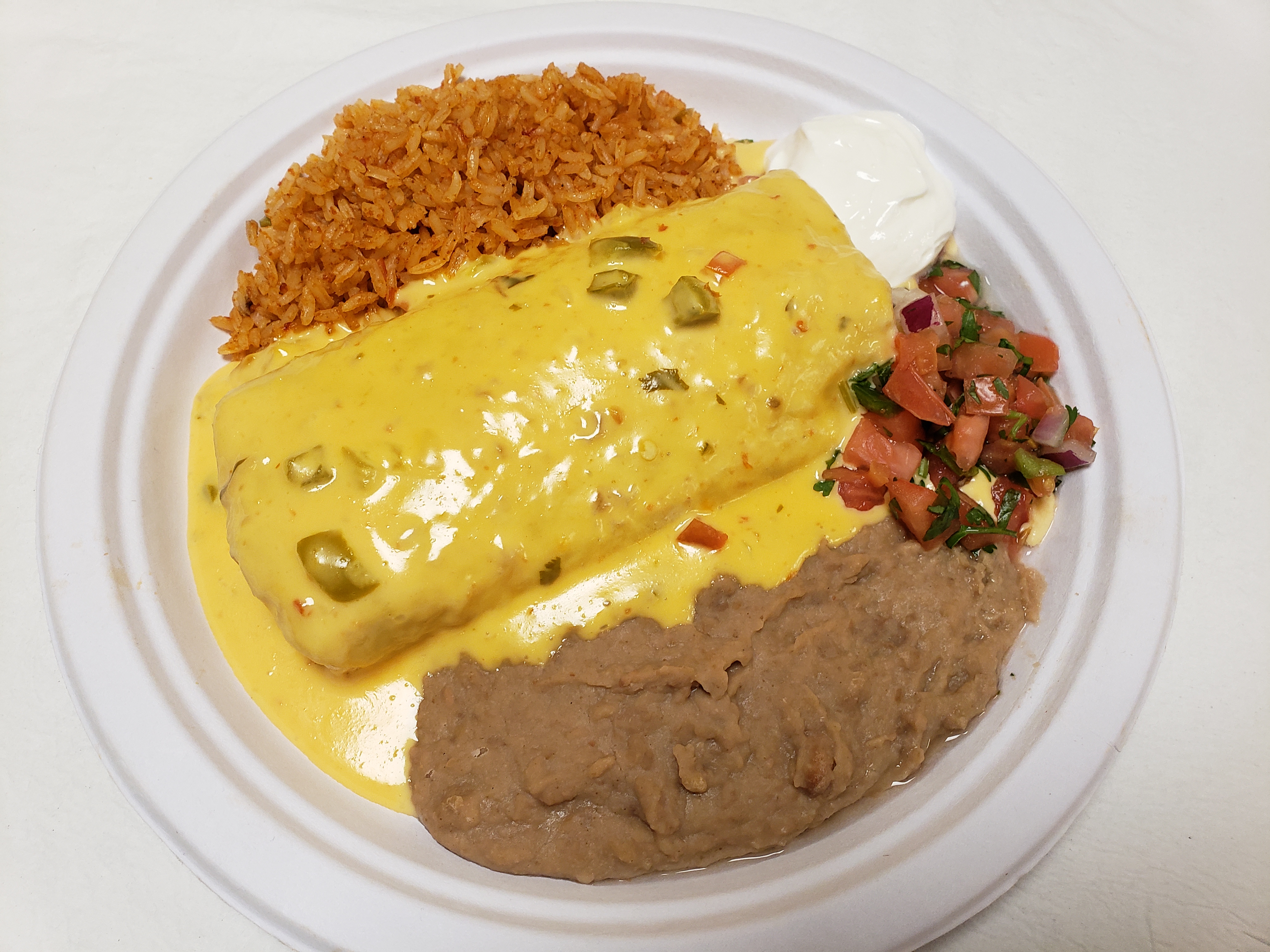 Order Poblanos Burrito Plate food online from Poblanos Mexican Cafe store, Dallas on bringmethat.com