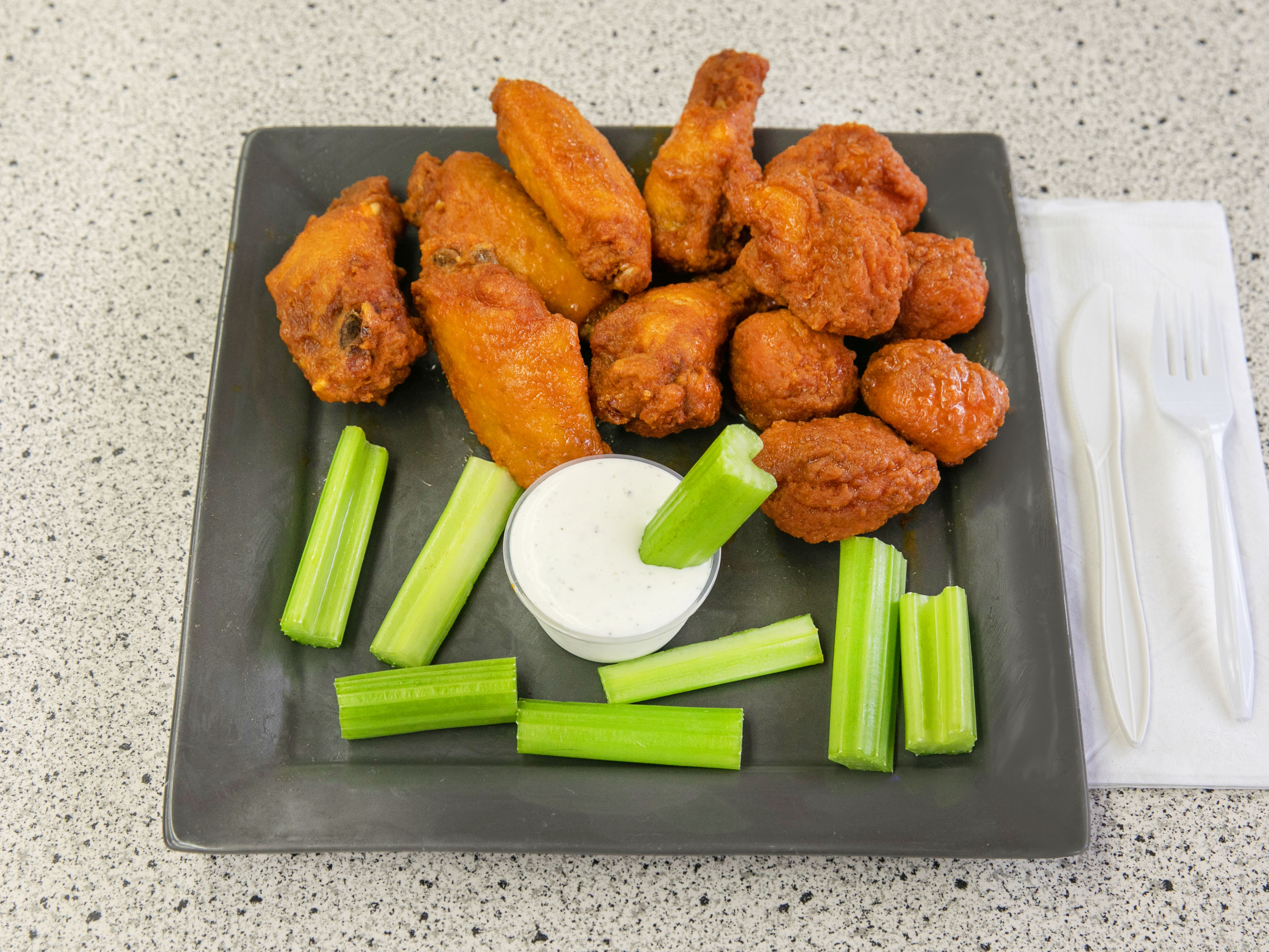 Order 12 Buffalo Wings food online from PJs Grill store, Columbus on bringmethat.com
