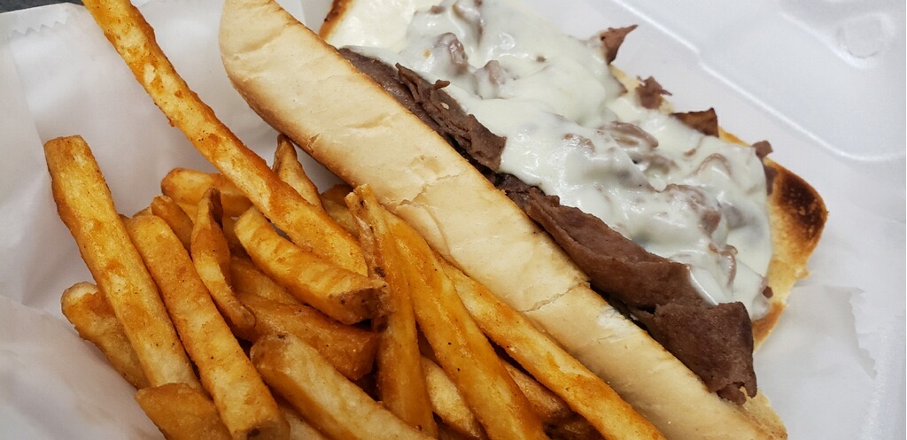Order Philly Cheese Steak Sandwich food online from 1st Place Sports Bar store, Hoffman Estates on bringmethat.com