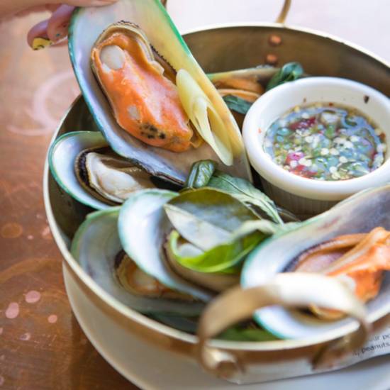Order Steamed Basil Mussels food online from Otus Thai Kitchen & Coffee store, West Hollywood on bringmethat.com