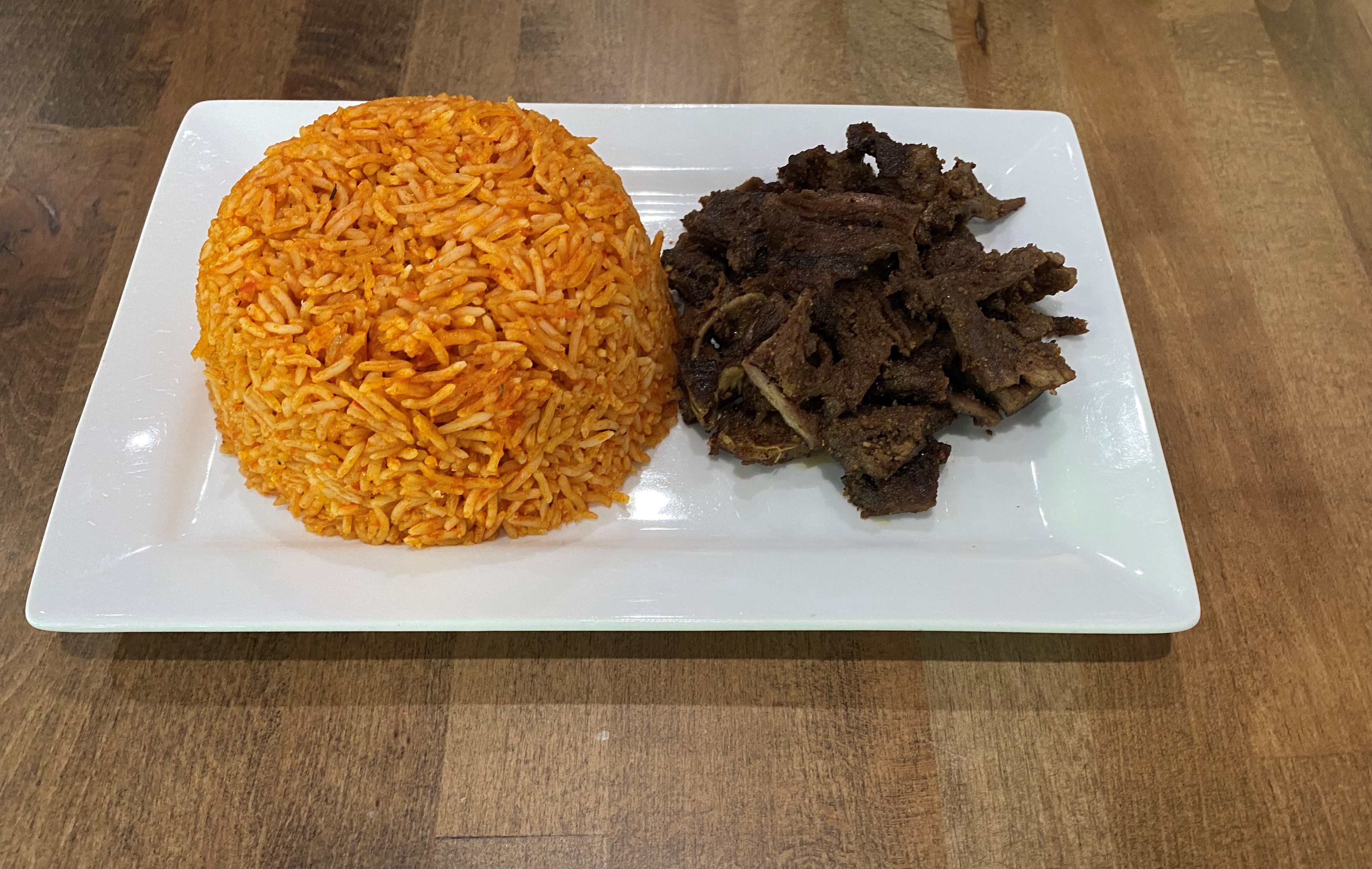 Order Jollof Rice and Beef Suya food online from Fusion Vibes Kitchen + Bar store, Richardson on bringmethat.com
