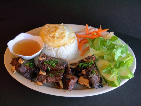 Order 72. Com Suon Dai Han food online from Pho Vn Cuisine store, Fishers on bringmethat.com