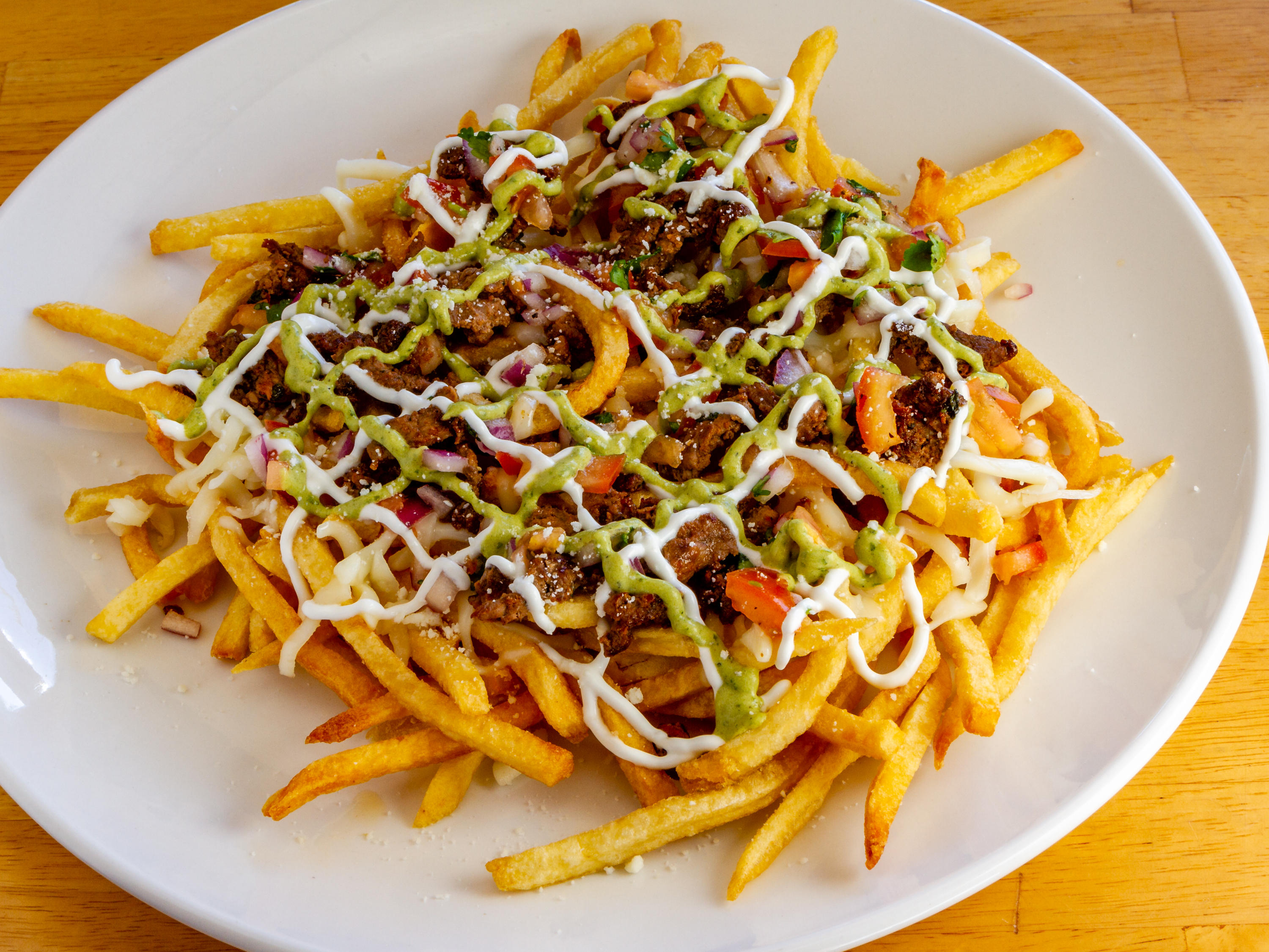 Order Carne Asada Fries food online from The Blind Tiger store, Tucson on bringmethat.com