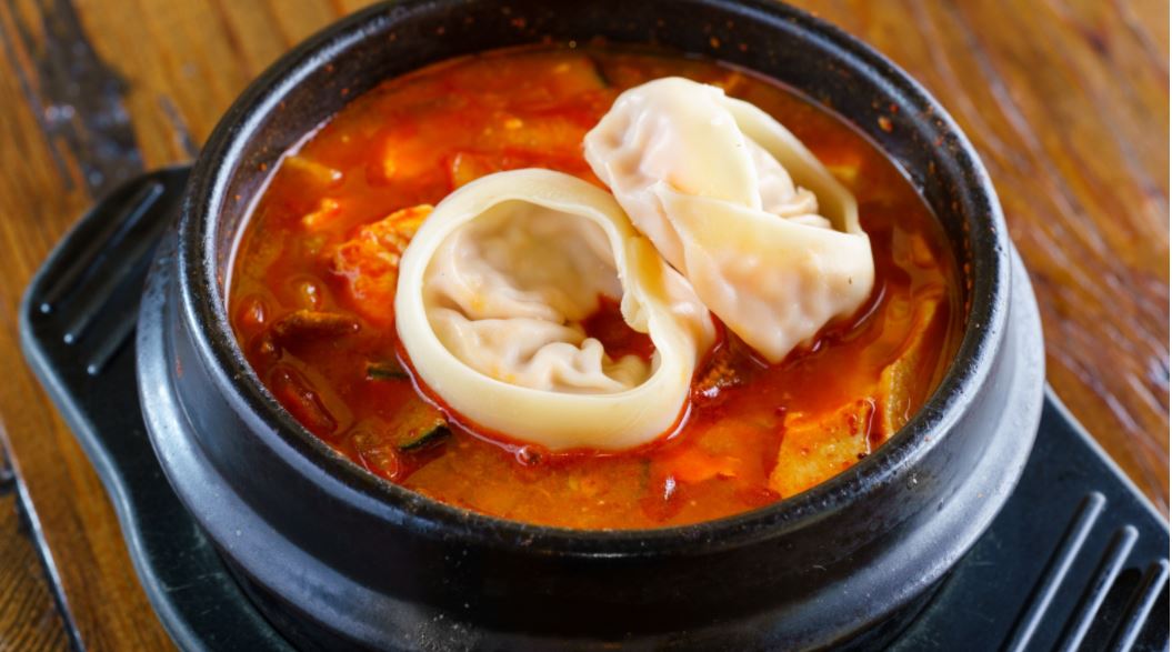 Order Dumpling Tofu Soup 만두 순두부 food online from Pyeong Chang Tofu store, Berkeley on bringmethat.com